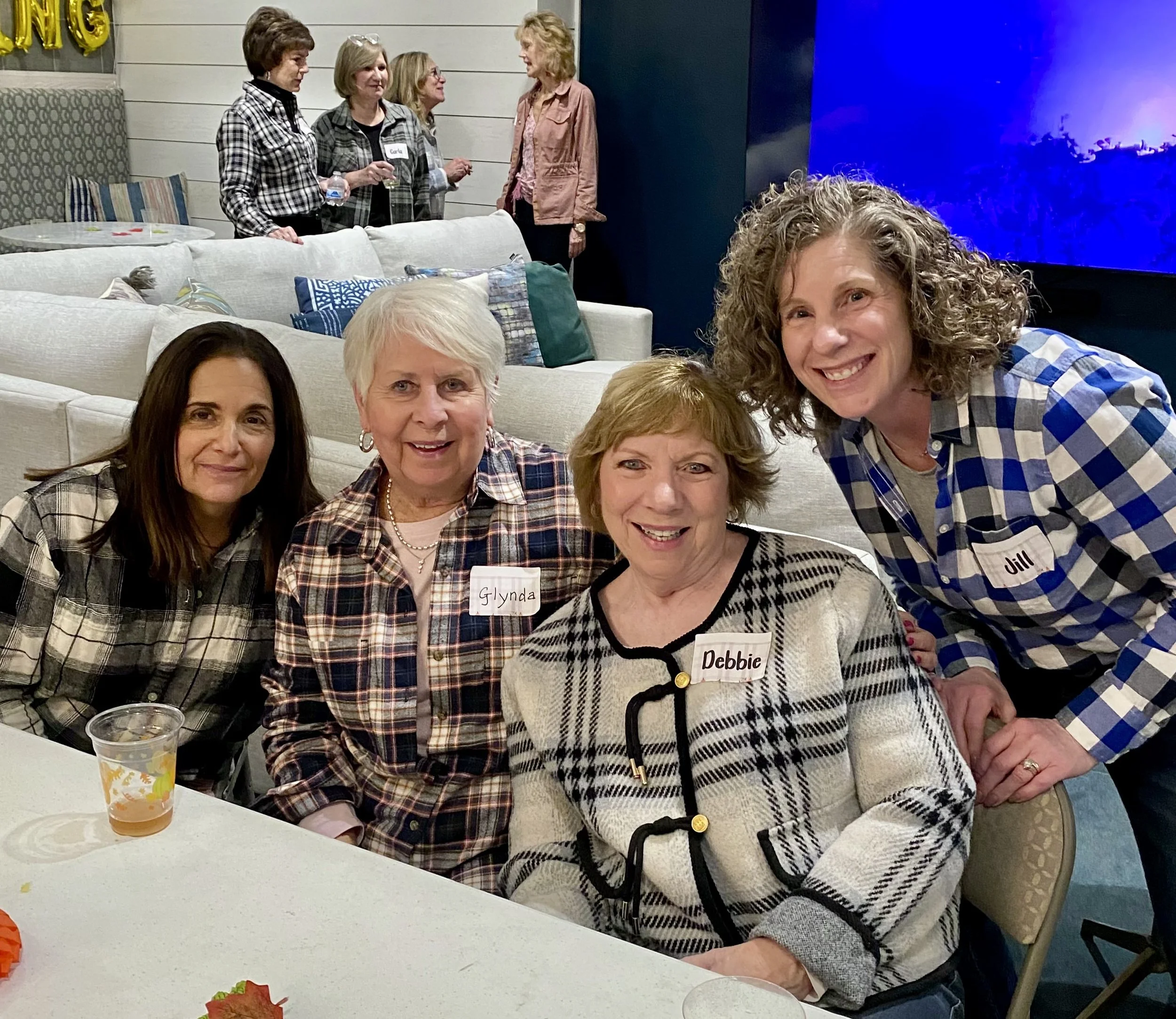 Widows Who Wine members sitting