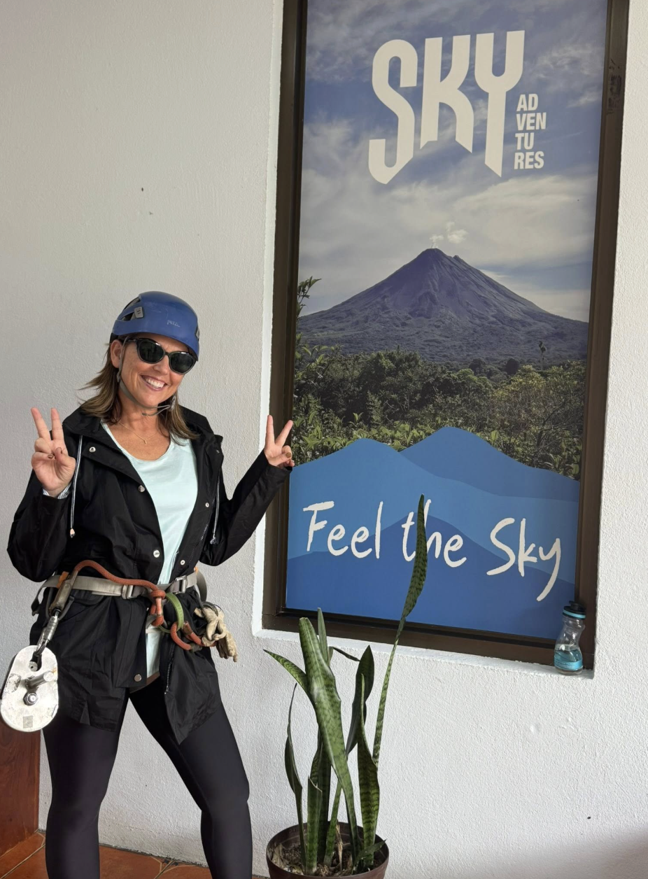 Widows Who Wine member wearing zipline gear