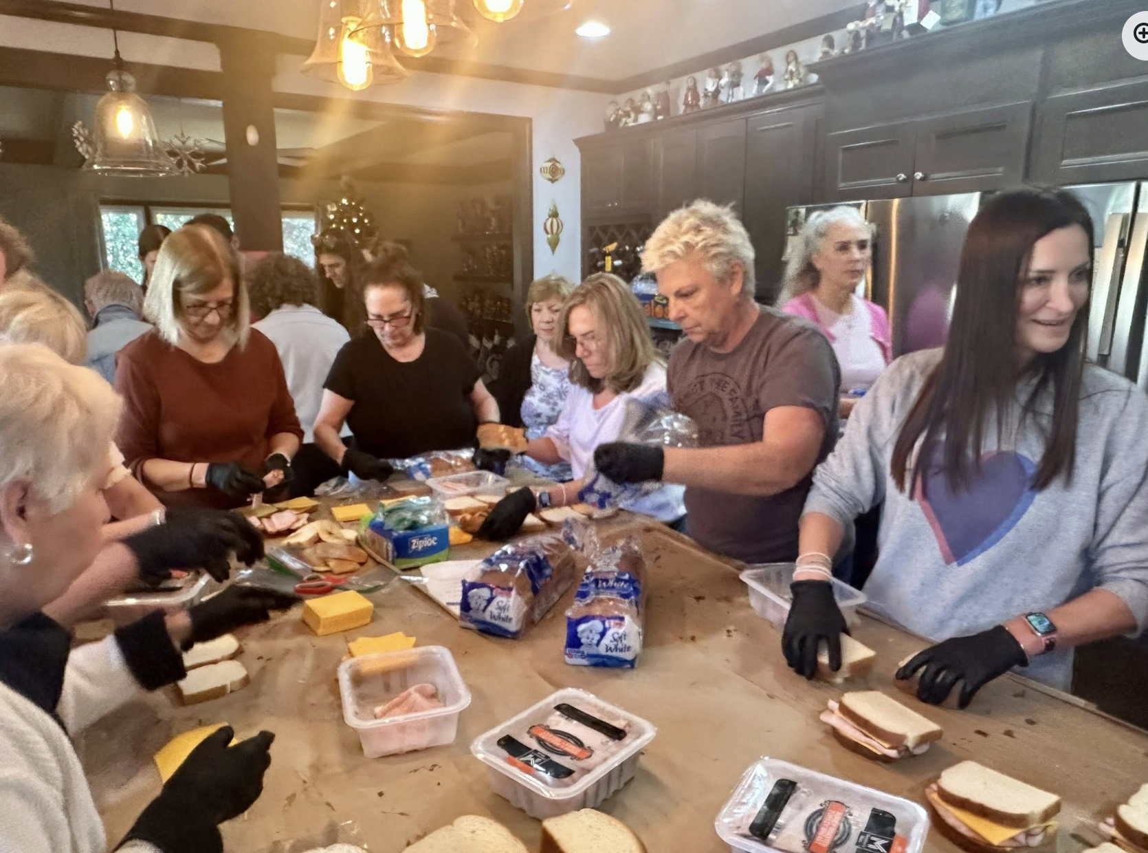 Widows Who Wine members assembling meals