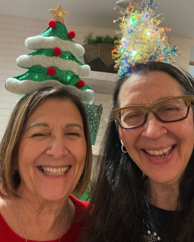 Widows Who Wine members wearing holiday hats