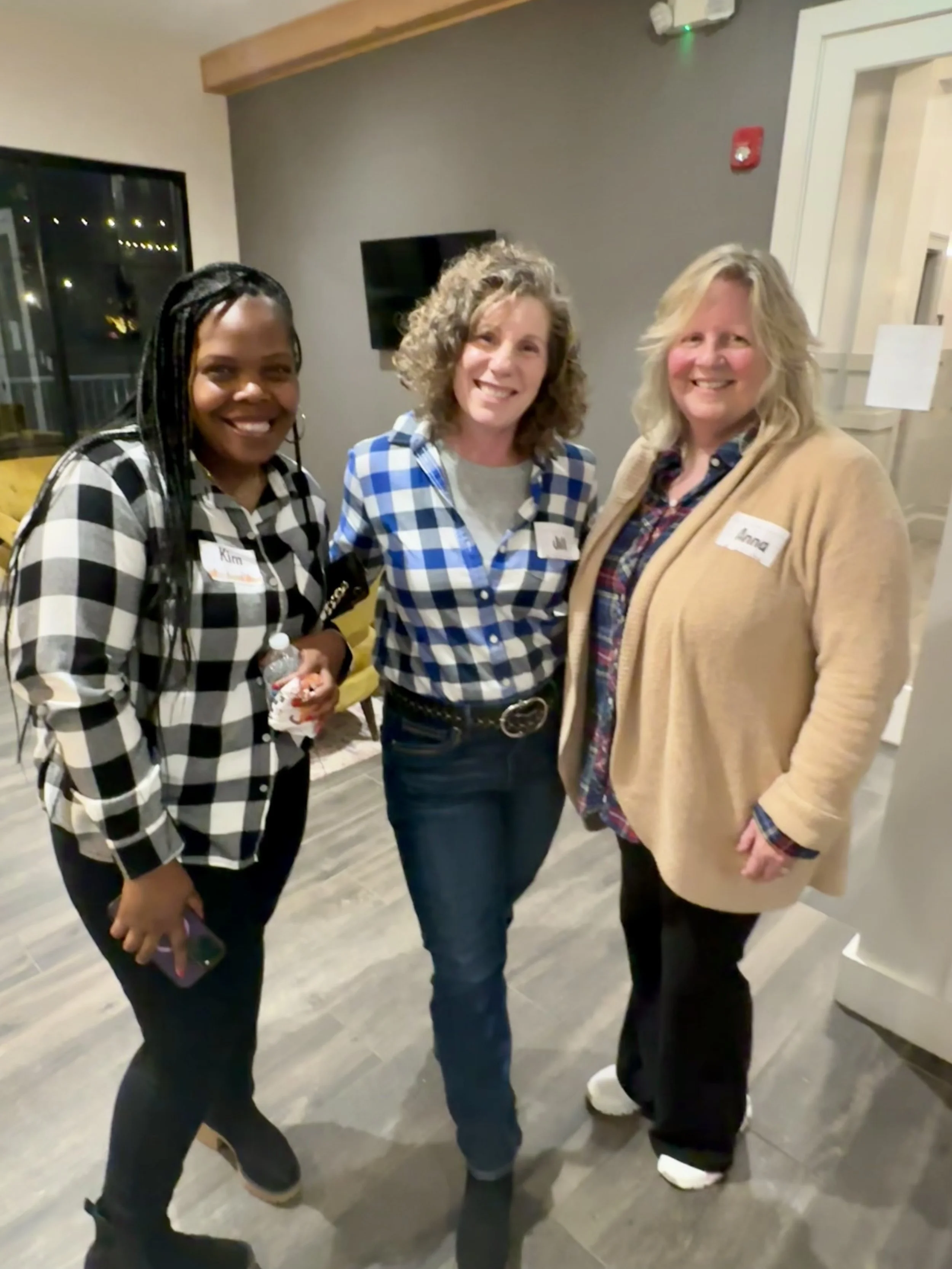 Widows Who Wine members standing