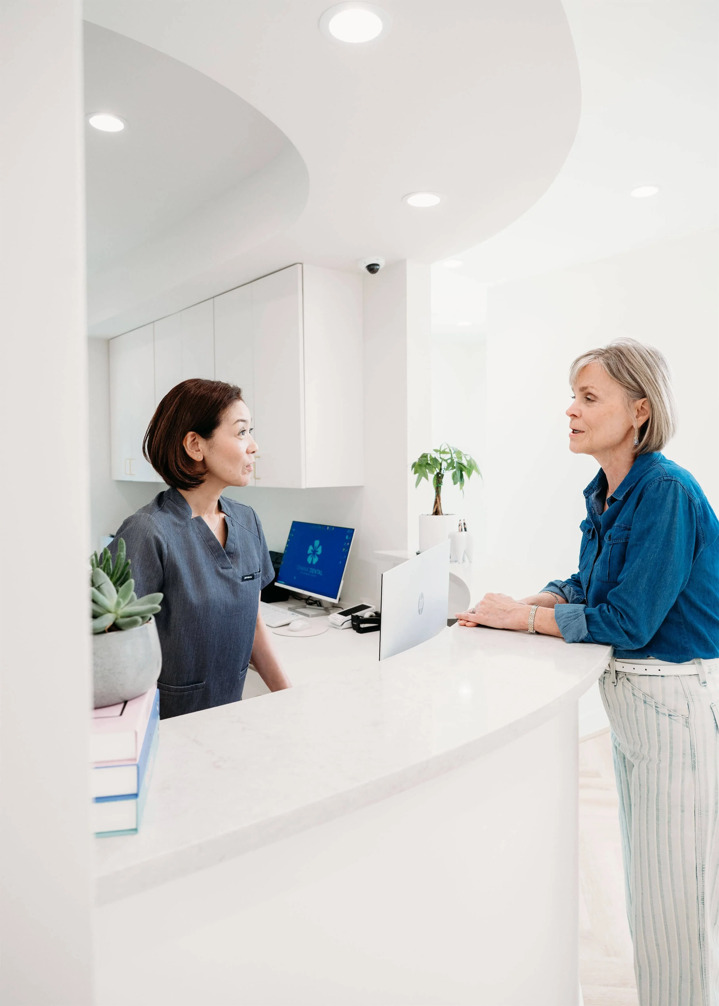 Customer at Reception Desk — Ohana Dental | Dentist in Midland Park, NJ for Family, General & Cosmetic Dentistry