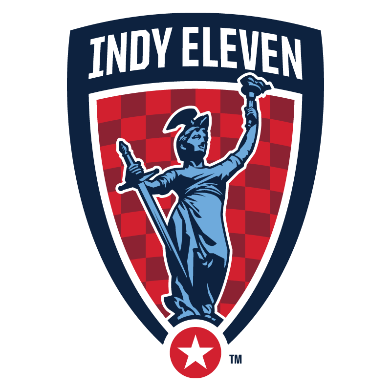 The logo of Indy Eleven soccer team featuring a blue statue of a man holding a sword and torch, with a red checkered background. The team name is at the top and a star at the bottom.