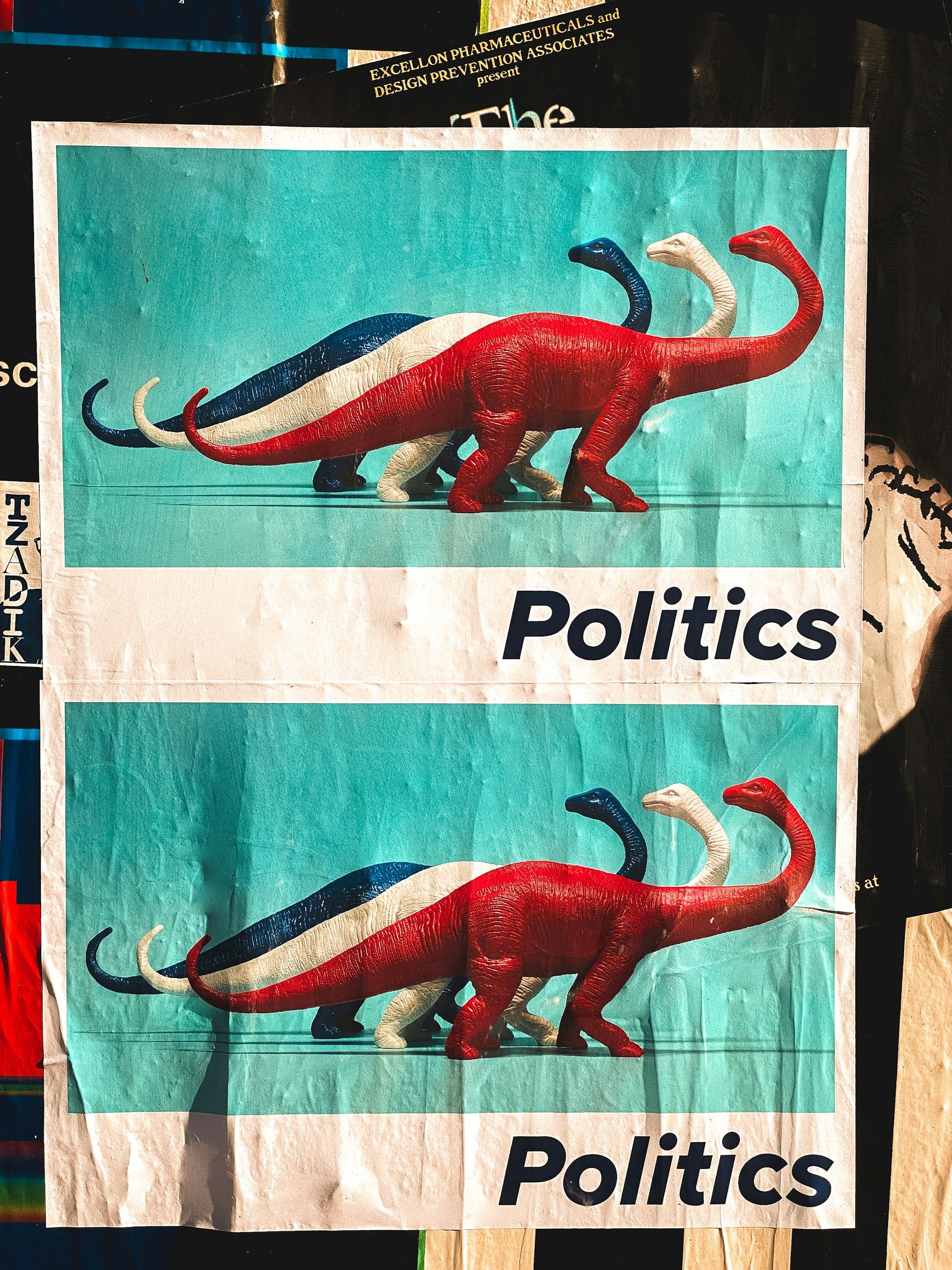 Two political posters featuring three dinosaur figurines with red, white, and blue coloring, labeled 'Politics'.
