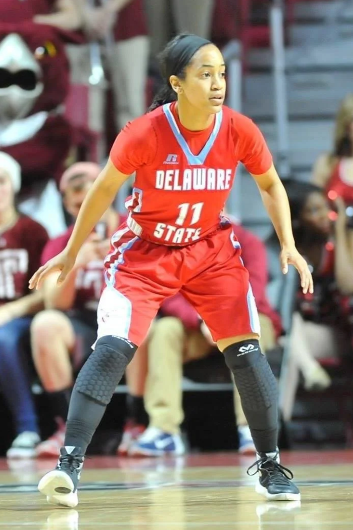 N'Kayah Kersey competing in a collegiate basketball game demonstrating leadership, discipline, and athletic performance.