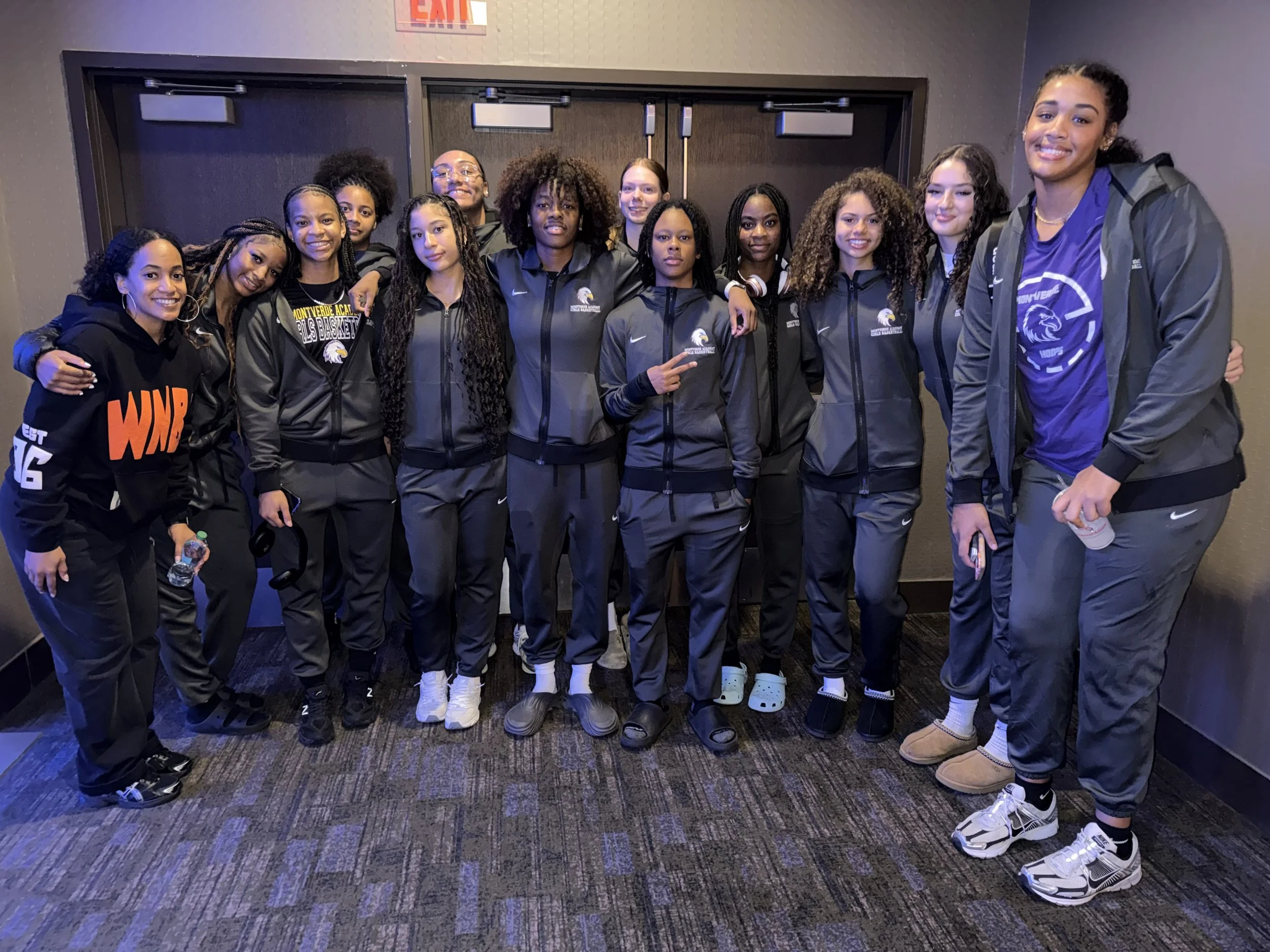 Group of female athletes participating in leadership, athlete wellness, and team culture development programming.