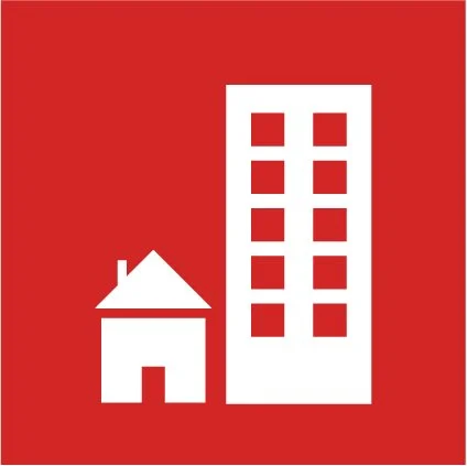 Icon of a small house and a tall building on a red background.