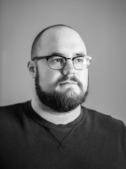 Black and white headshot of Chris Donovan.