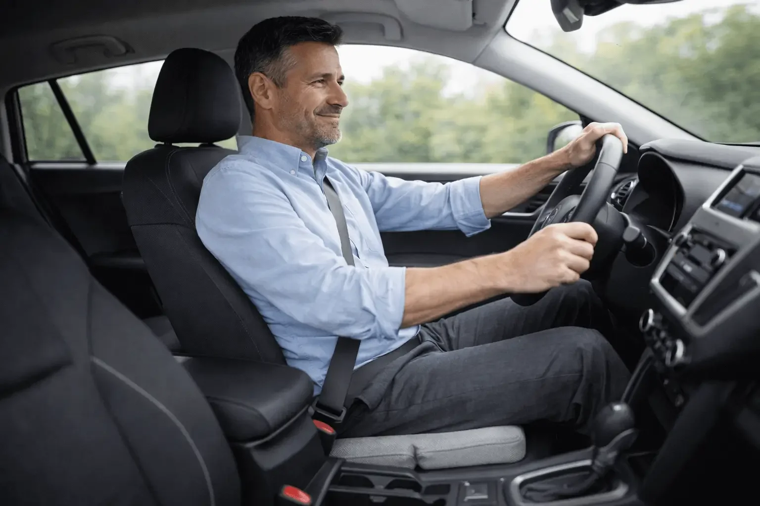 Man sitting comfortably with relief from prostatitis pain using therapeutic seat cushion