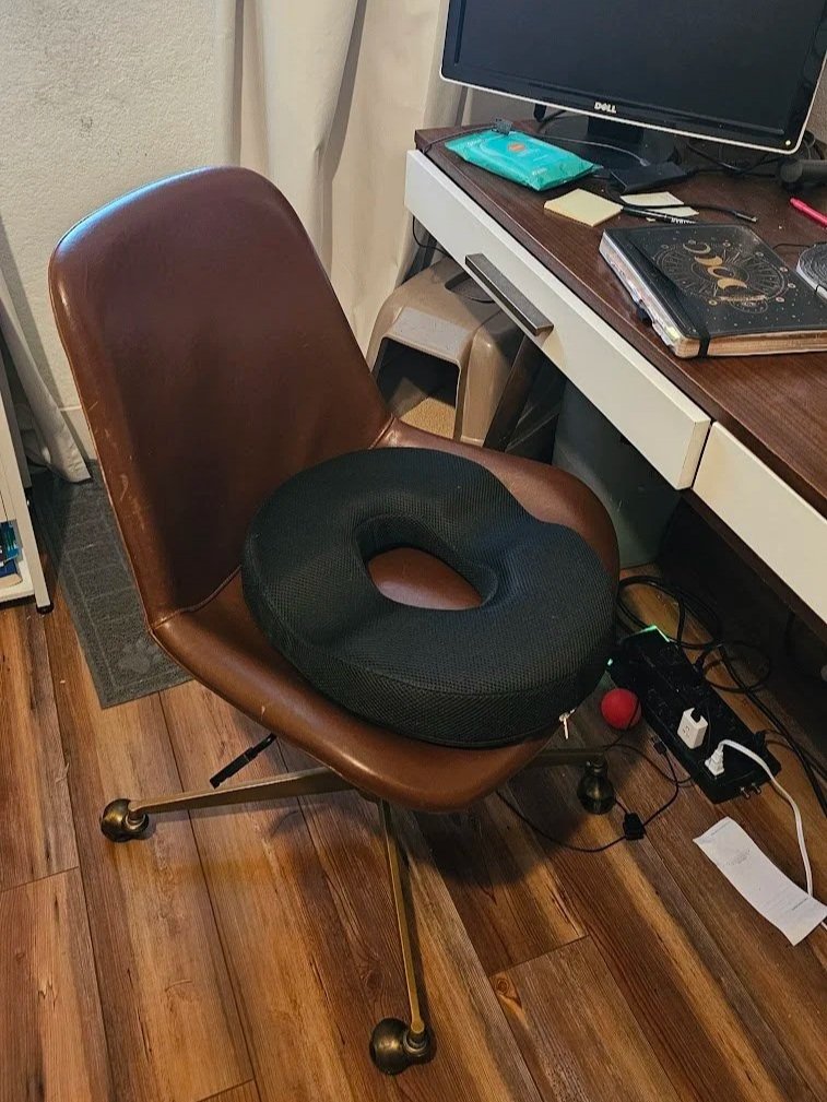 A donut cushion tried at a desk for pelvic pain relief