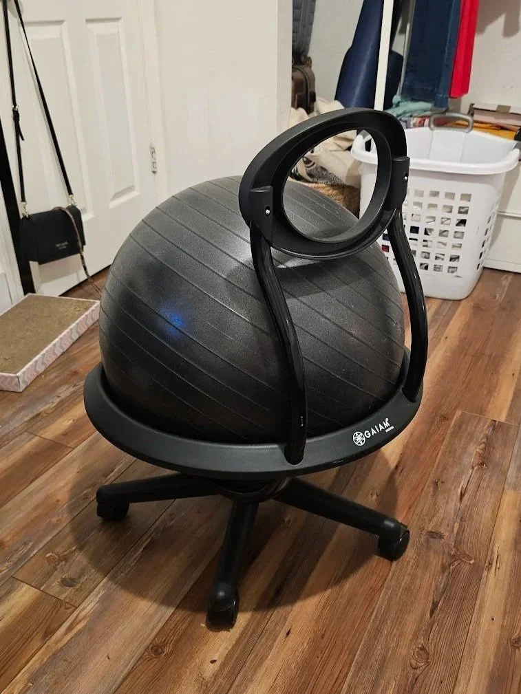 A yoga ball chair tried at a desk for pelvic pain relief