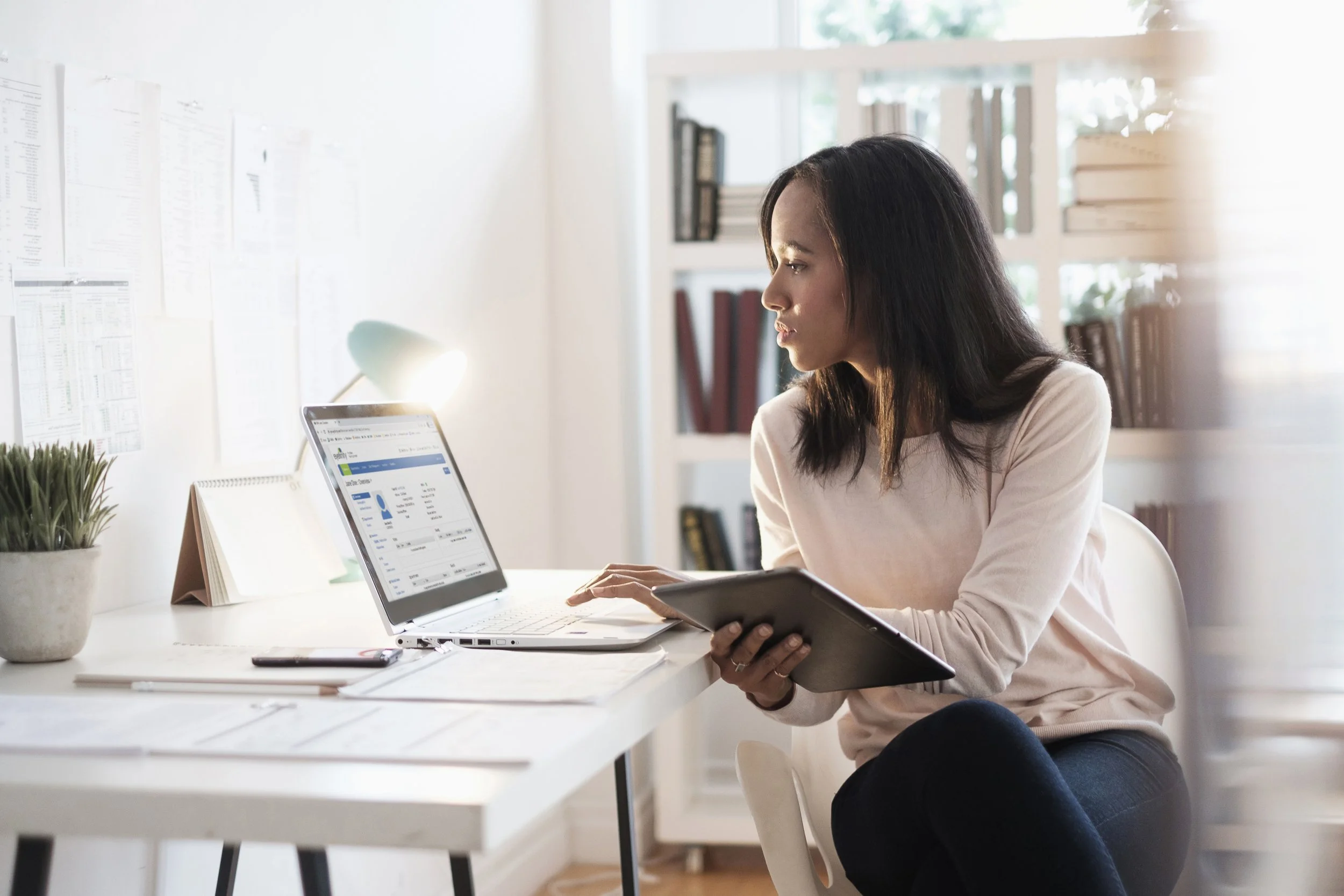 Women looking at computer screen