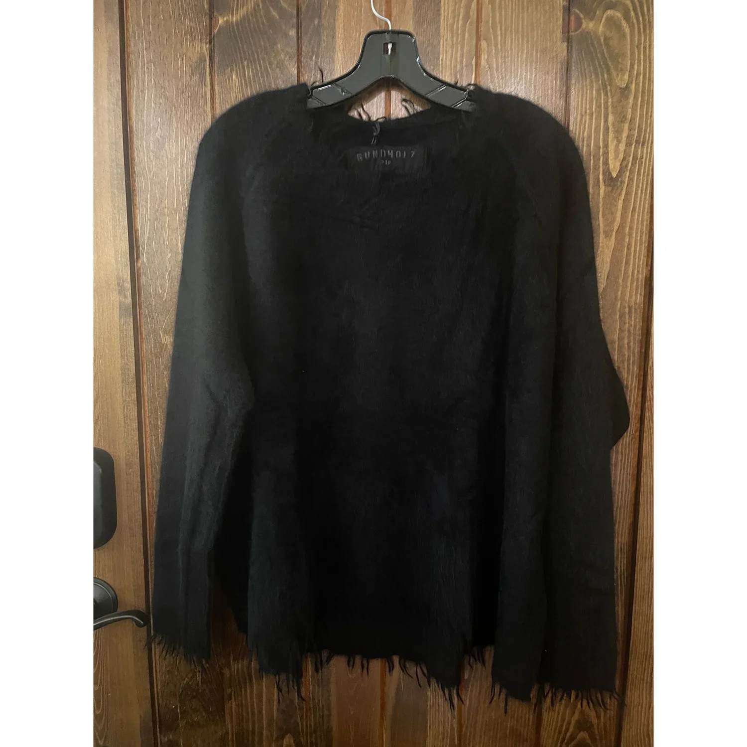 Rundholz_Black_Sweater.webp