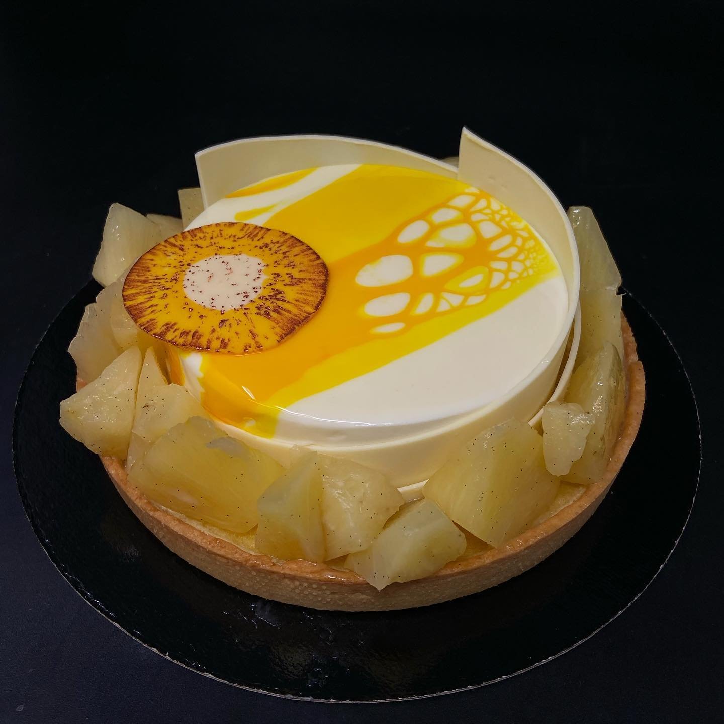 If you like pi&ntilde;a coladas . . . 
enjoy a Pineapple and Coconut tart!

coconut mousse &bull; sweet pastry &bull; Normandy filling &bull; poached pineapple &bull; white chocolate glaze 

#thepatesserie #caas #swisseducated