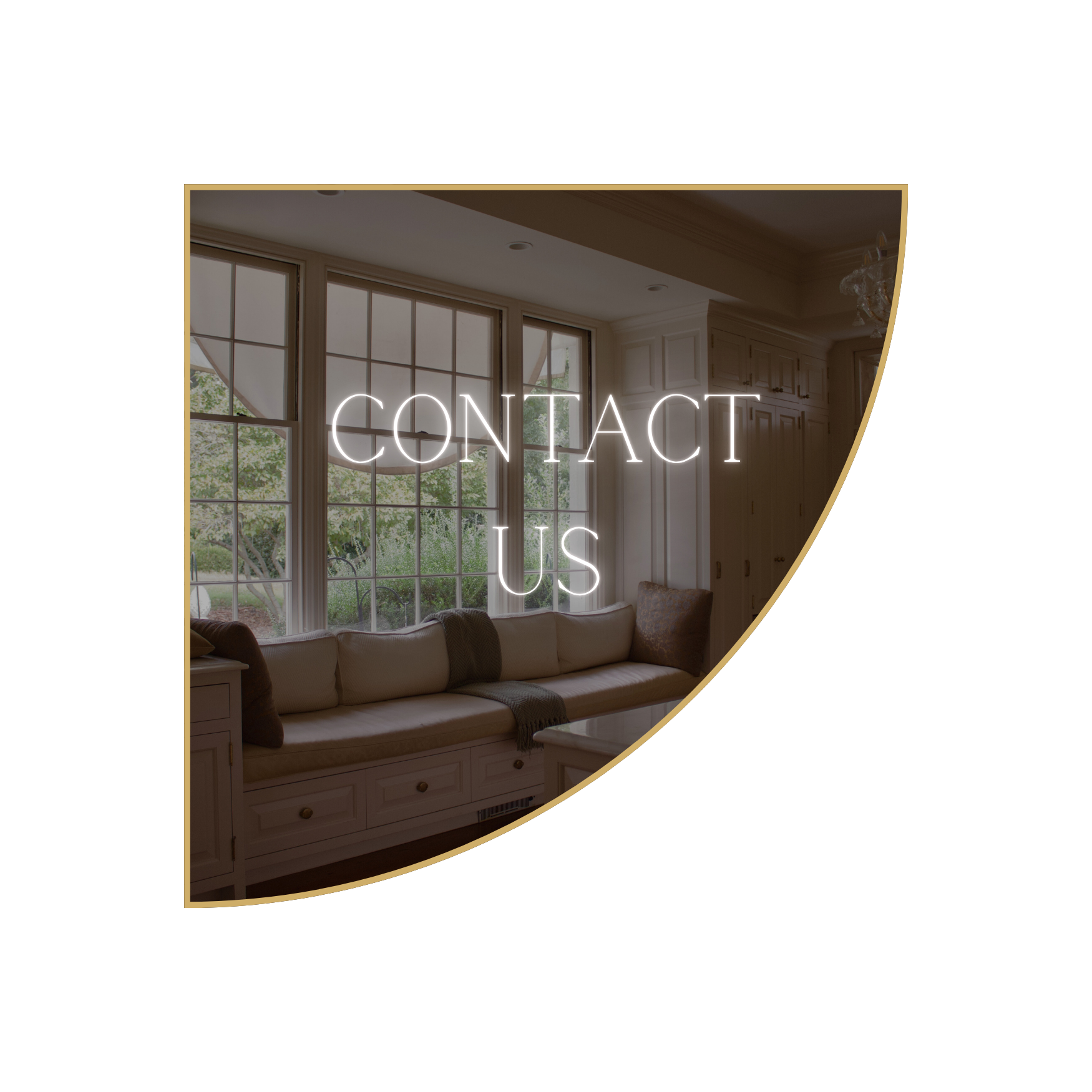 Living room with large window, beige couch, cushions, and a neon sign reading 'CONTACT US'