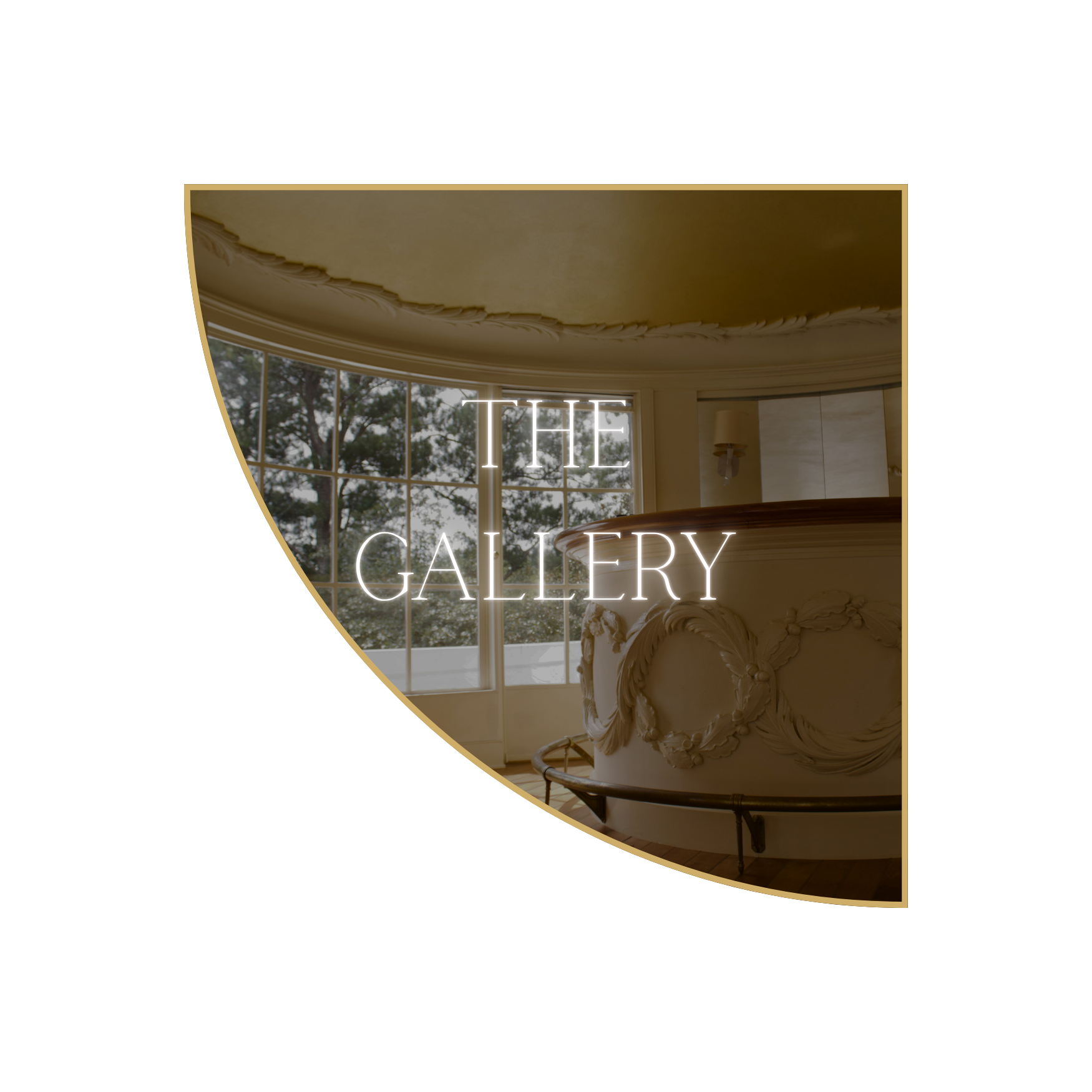 Interior of an art gallery with large windows, ornate ceiling molding, and a neon sign that reads 'The Gallery'