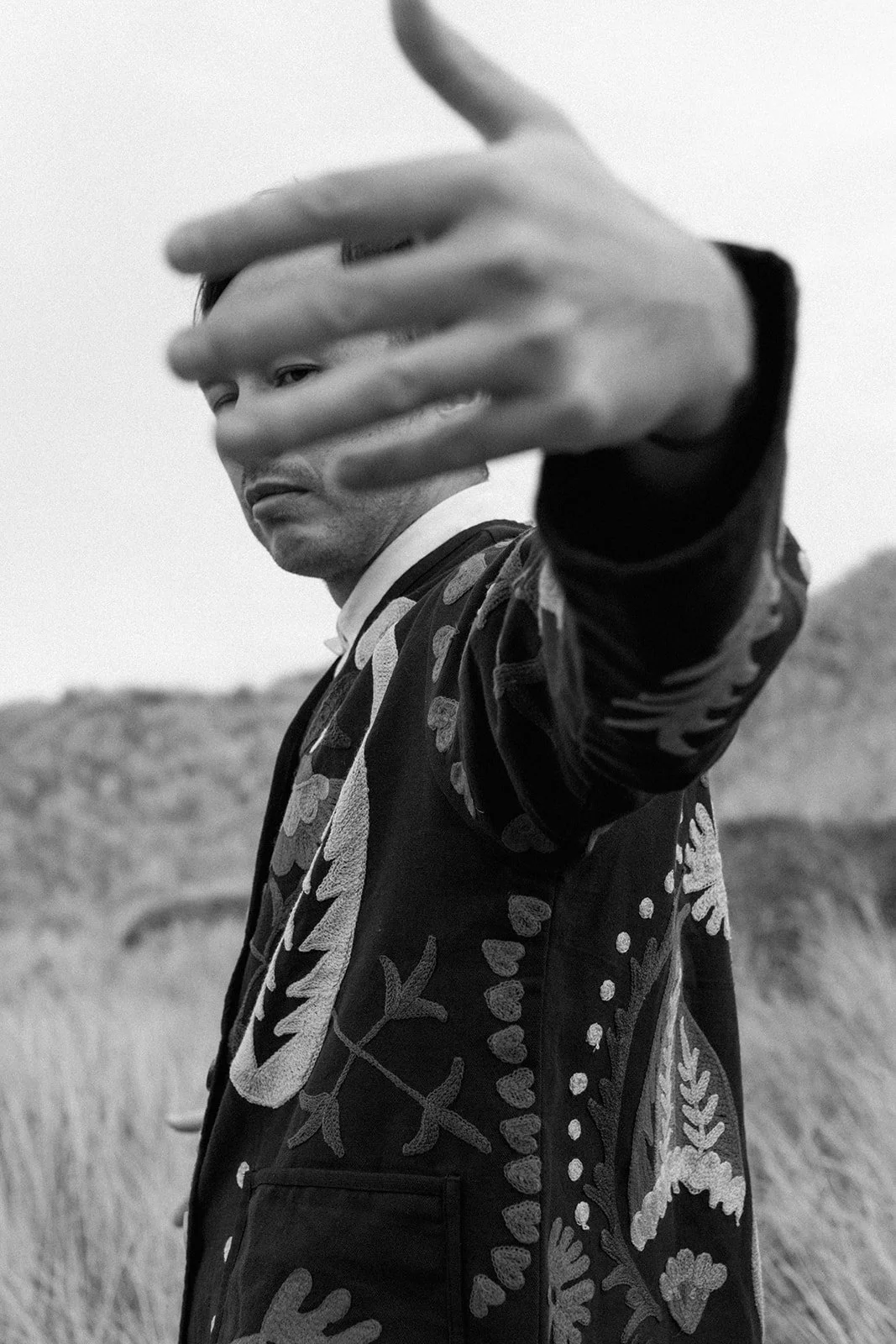 Man in cool jacket looking wisely