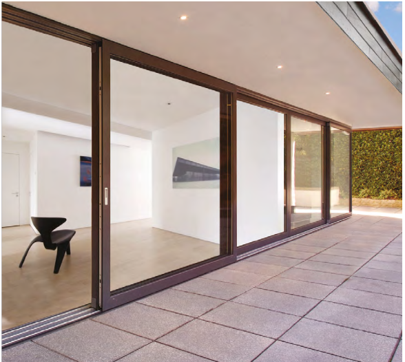 Lift-slide glass door wall with recessed sill and large-format panels for seamless indoor-outdoor flow.