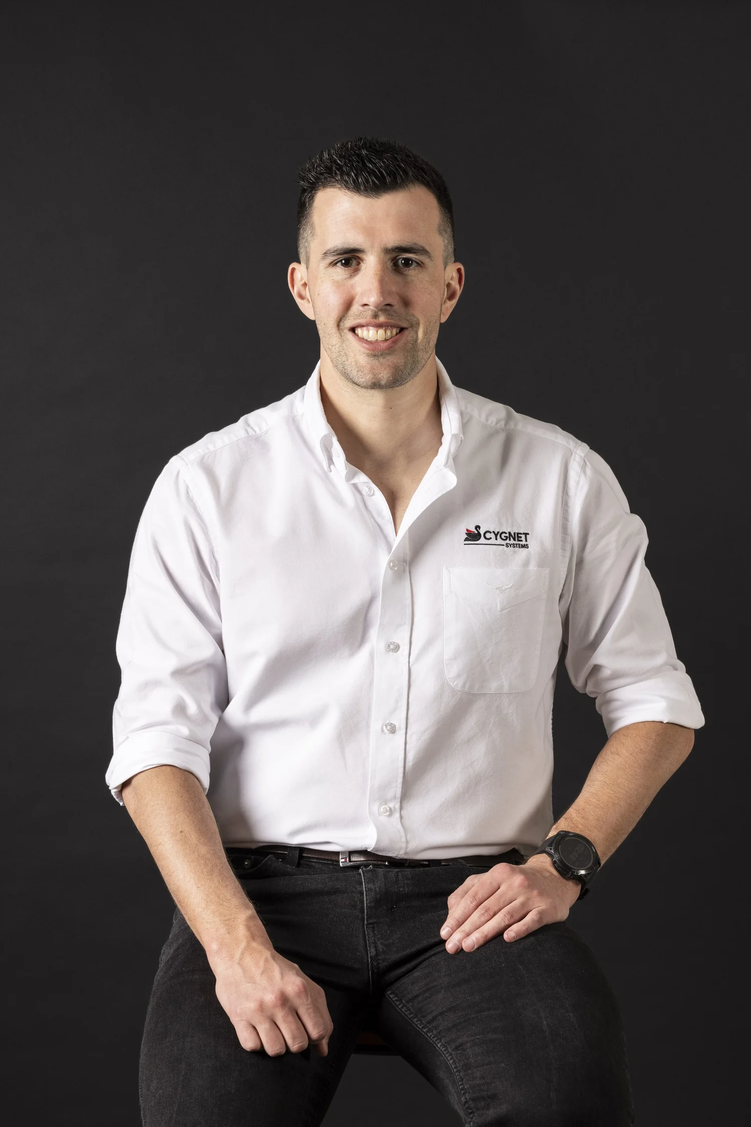 Studio portrait on a dark background