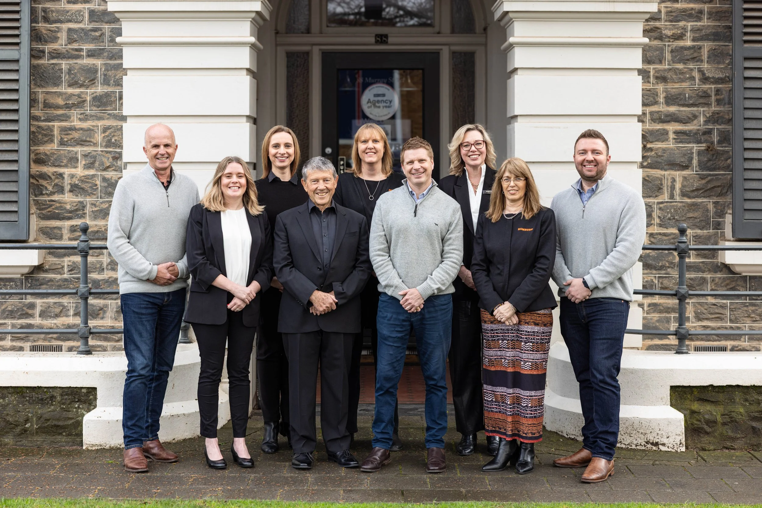 Real estate team portrait at a heritage office entrance, Barossa Valley
