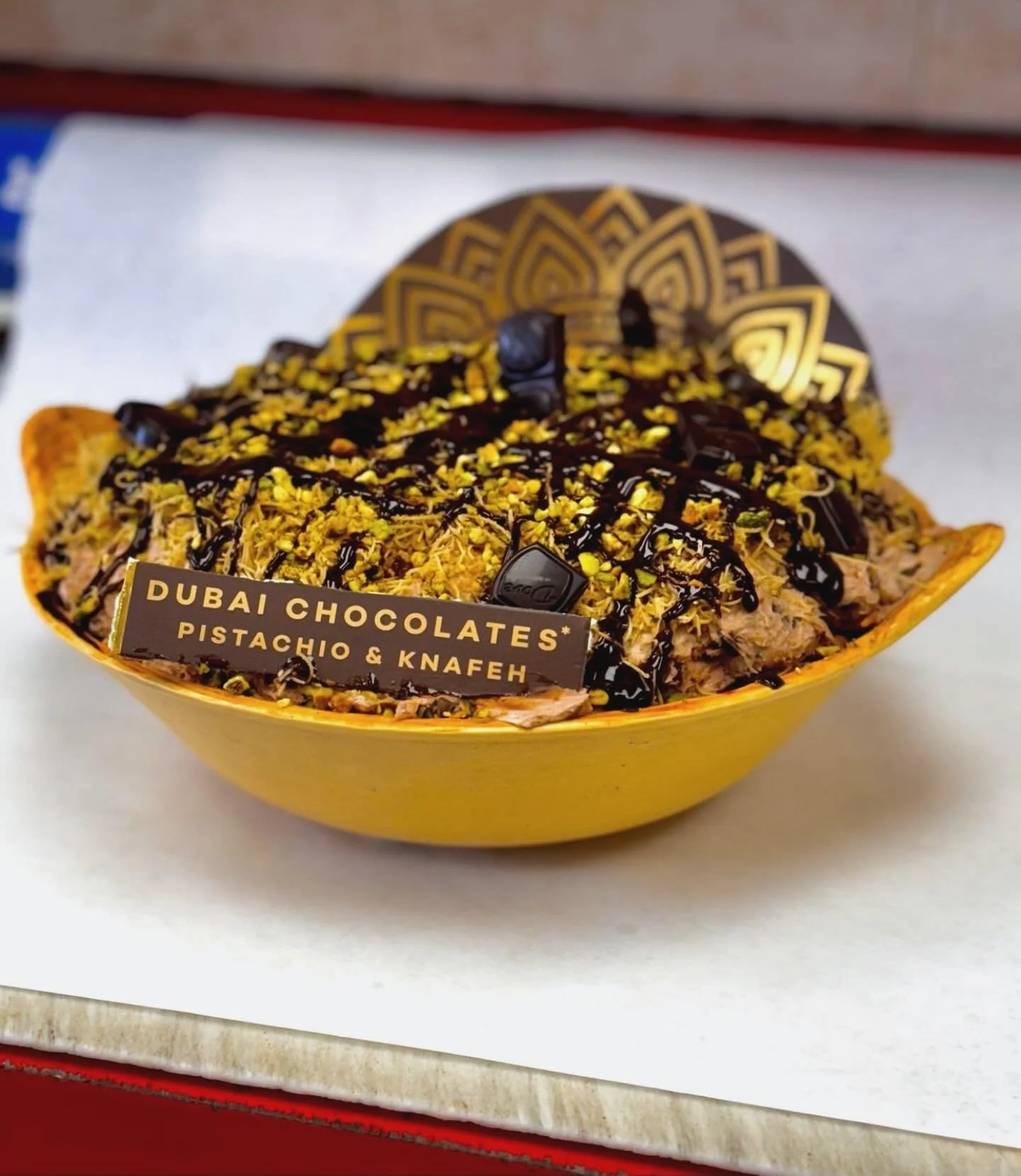 Not you average spread - this one comes with a passport. Come try our Dubai Chocolate Cream Cheese