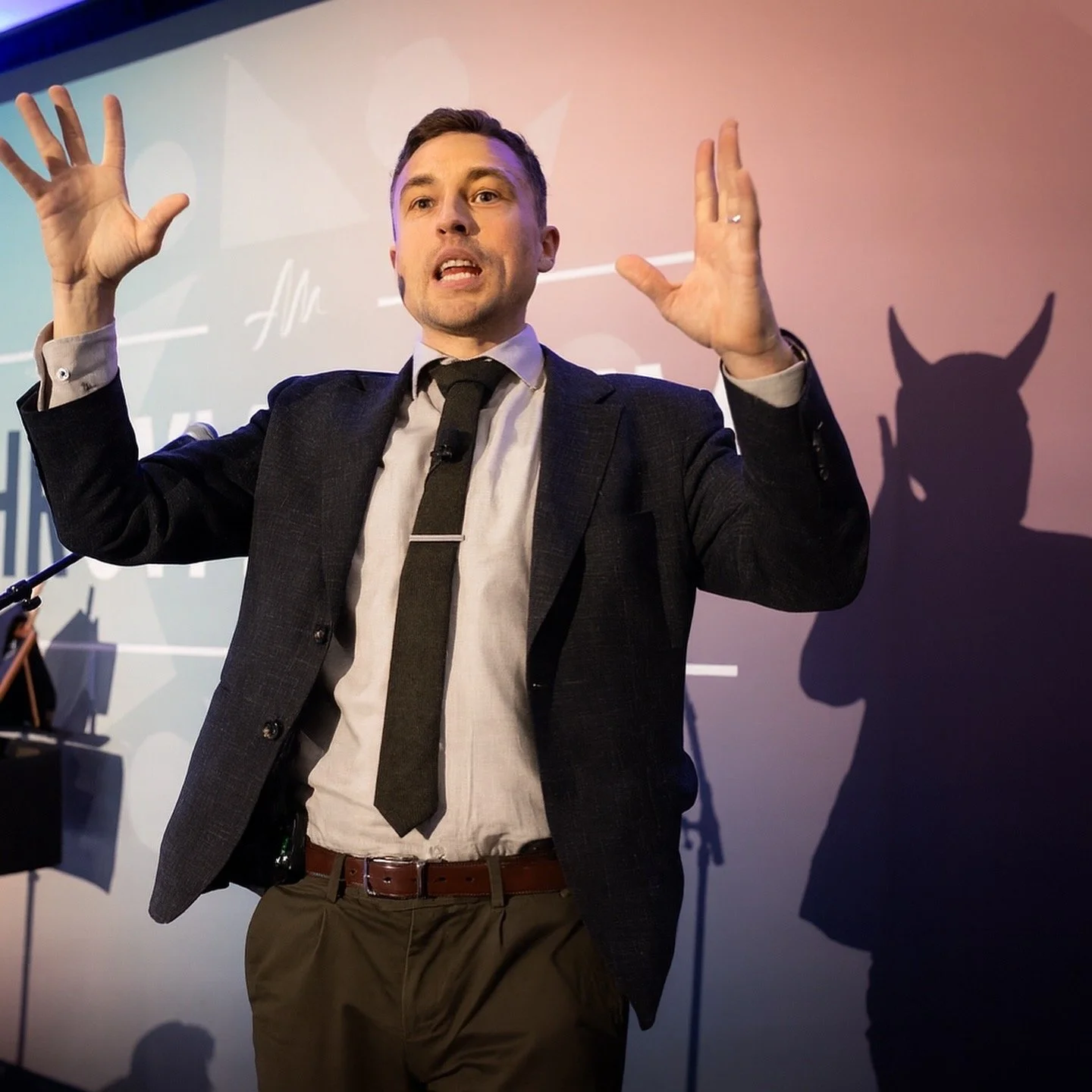 Andy Nunn delivering a mindset keynote, illustrating behavioural science concepts through live demonstrations.