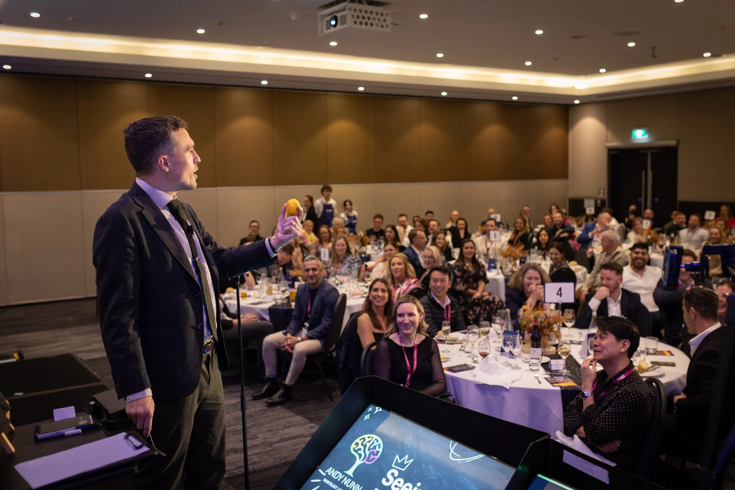 Andy Nunn creating an interactive audience moment on stage