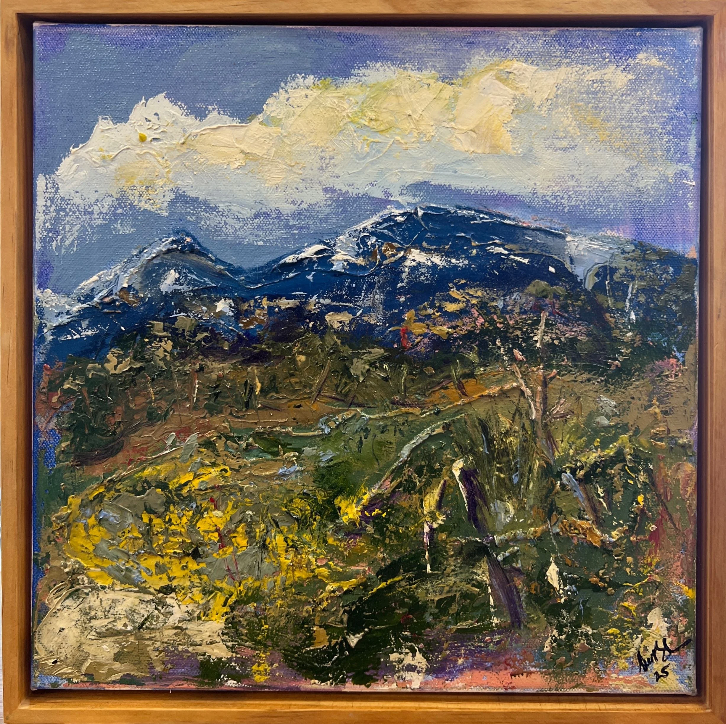 An impressionist-style painting of a mountain landscape with snowy peaks, a cloudy sky, and lush green and yellow foliage in the foreground.