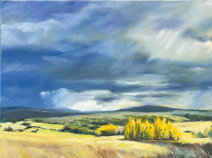 A landscape painting showing a cloudy sky over rolling hills with a cluster of yellow trees in the foreground.