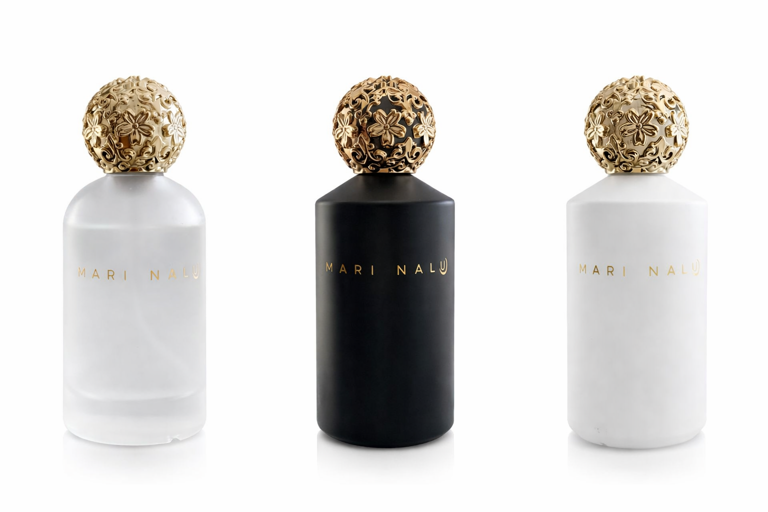 Minimalist Mari Nalu perfume bottles with golden floral caps, showcasing a niche fragrance collection.