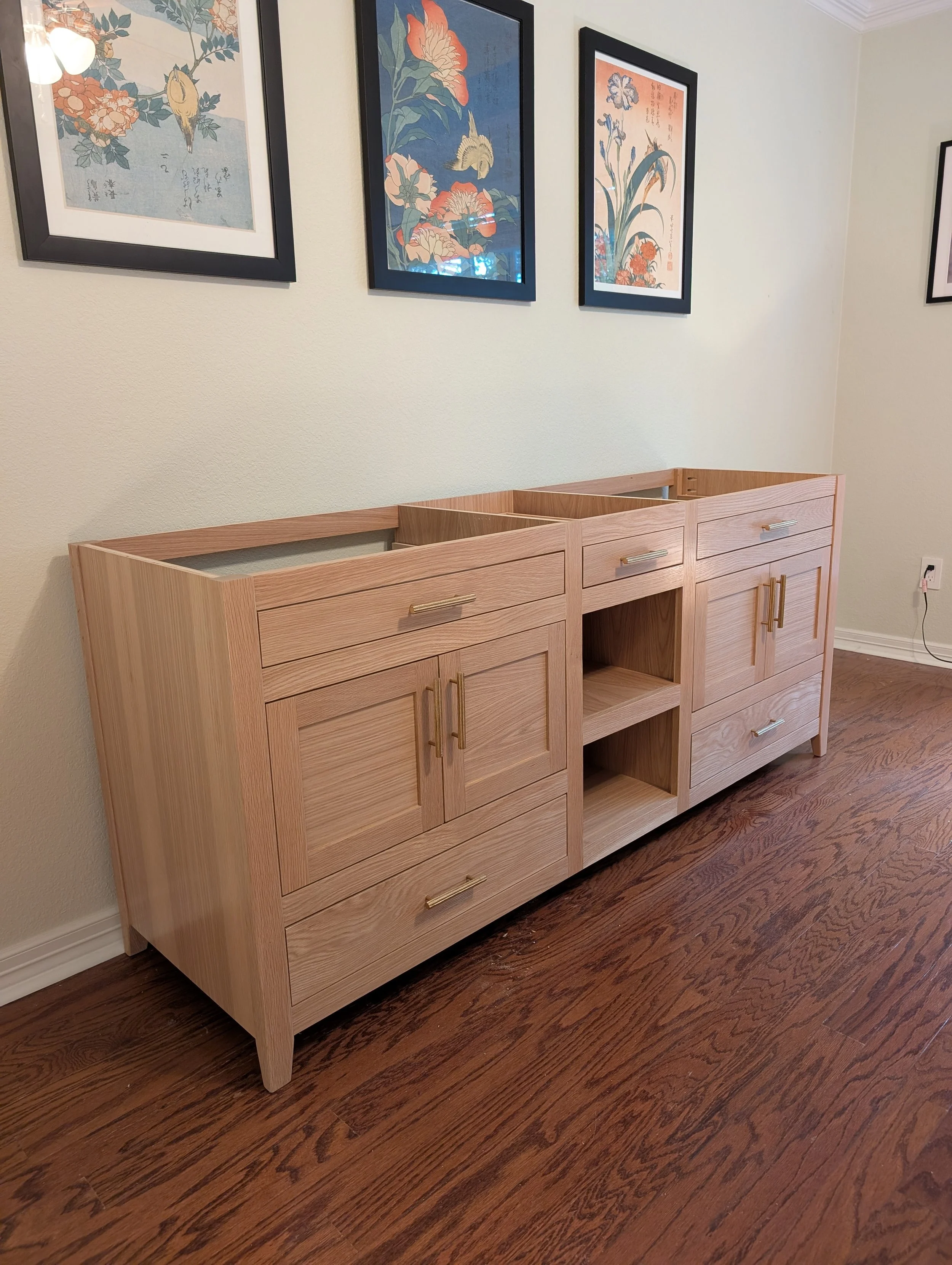 White Oak bathroom vanity with gold pulls