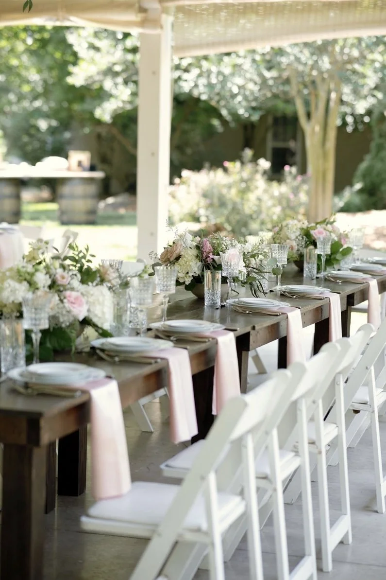 Outdoor wedding reception. White event tent, garden and vineyard wedding. Near Charlotte, NC.
