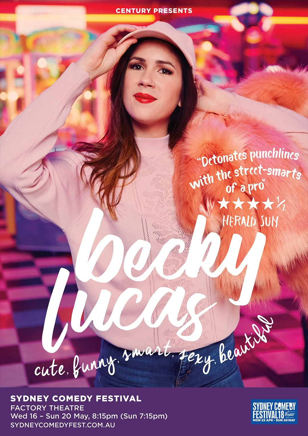 A woman with long brown hair, wearing a pink sweatshirt and a white cap, stands in front of a colorful amusement park. She holds the cap with one hand, and bears a confident expression. The image promotes the comedy show "Becky Lucas" at the Sydney C
