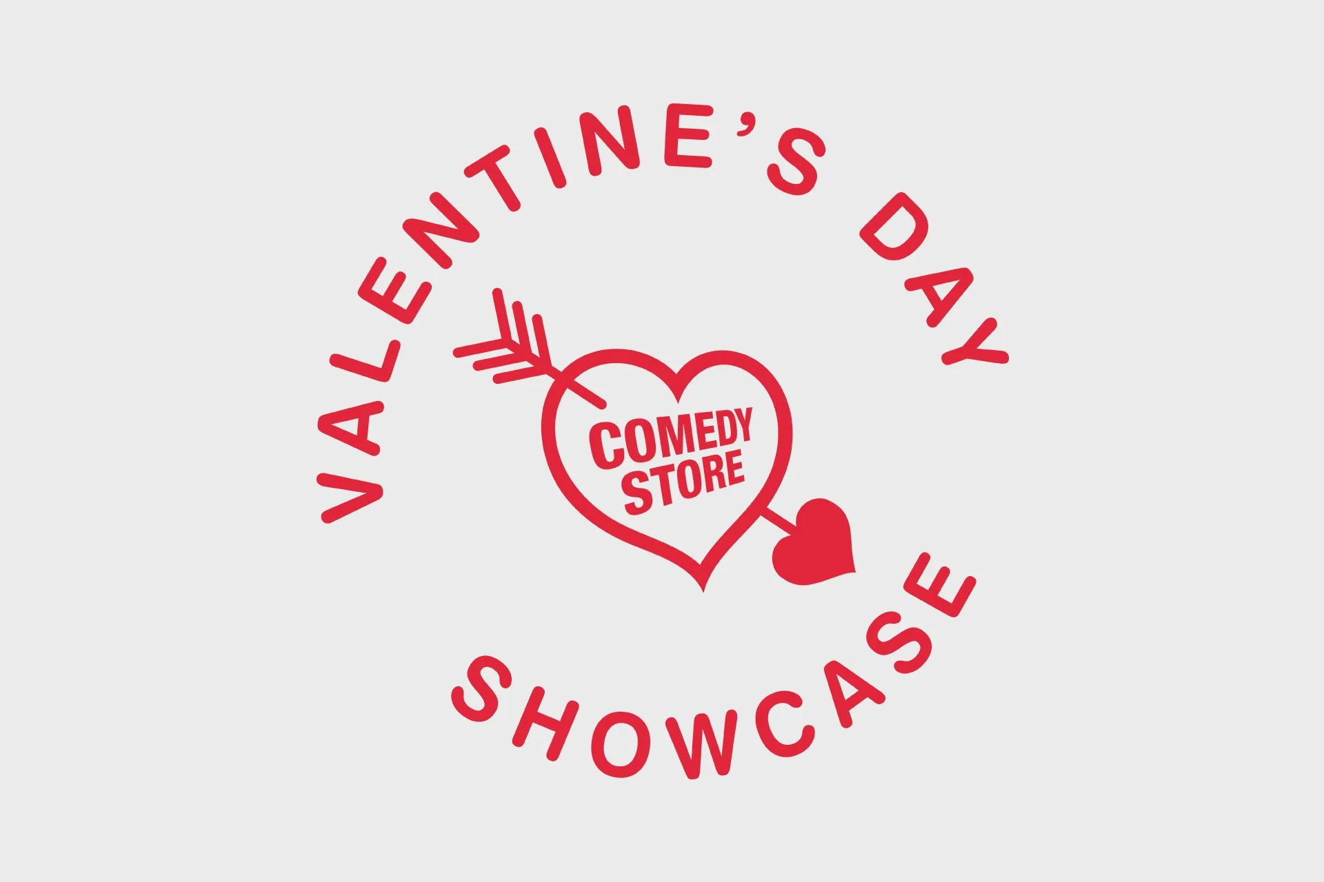 A circular logo with red text saying "Valentine's Day Showcase" and a red heart in the center labeled "Comedy Store" with an arrow through it.