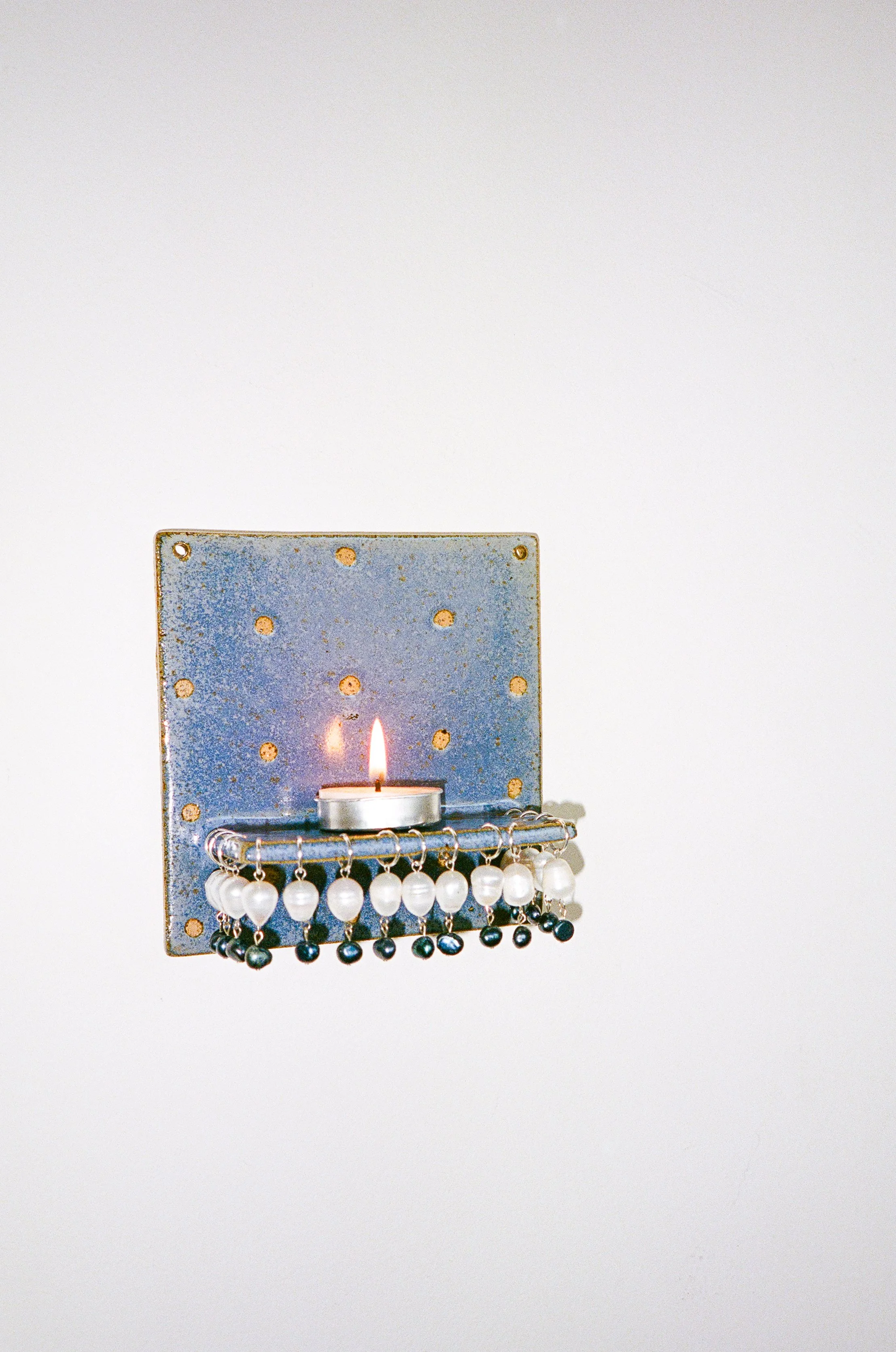 ECLIPSE CANDLE SCONCE