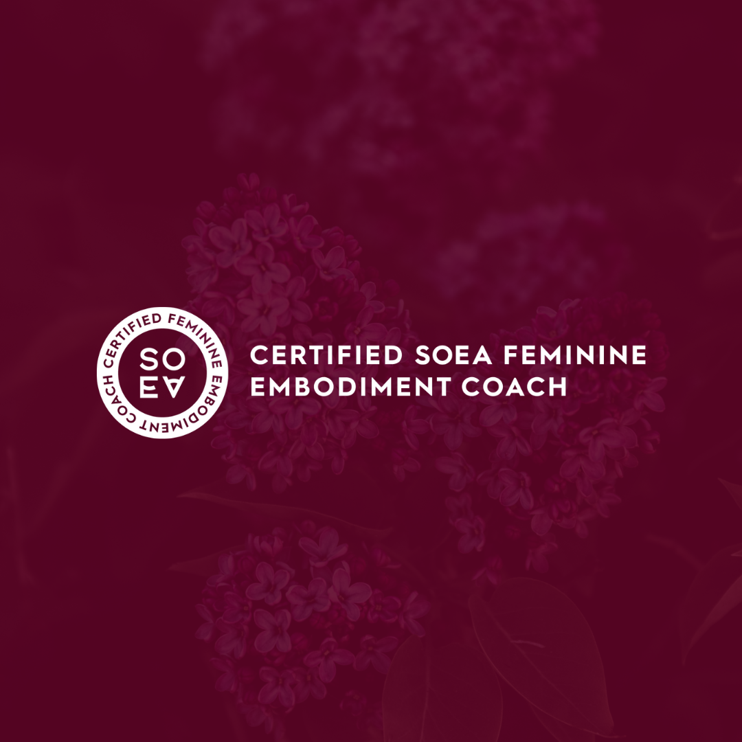 A background of purple flowers with white text that says 'Certified SOEA Feminine Embodiment Coach' and a circular logo with similar text.