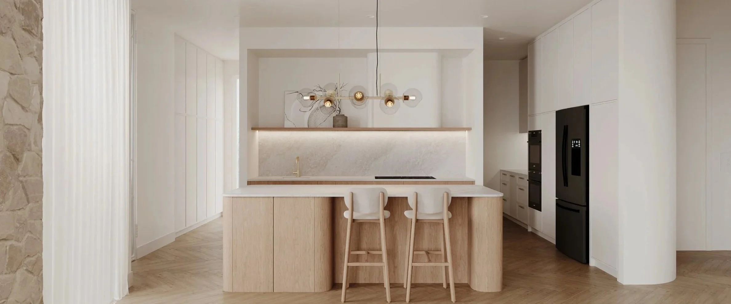 Modern kitchen with white cabinets, a black refrigerator, a marble countertop and backsplash, a wooden island with two bar stools, and a contemporary chandelier hanging above.