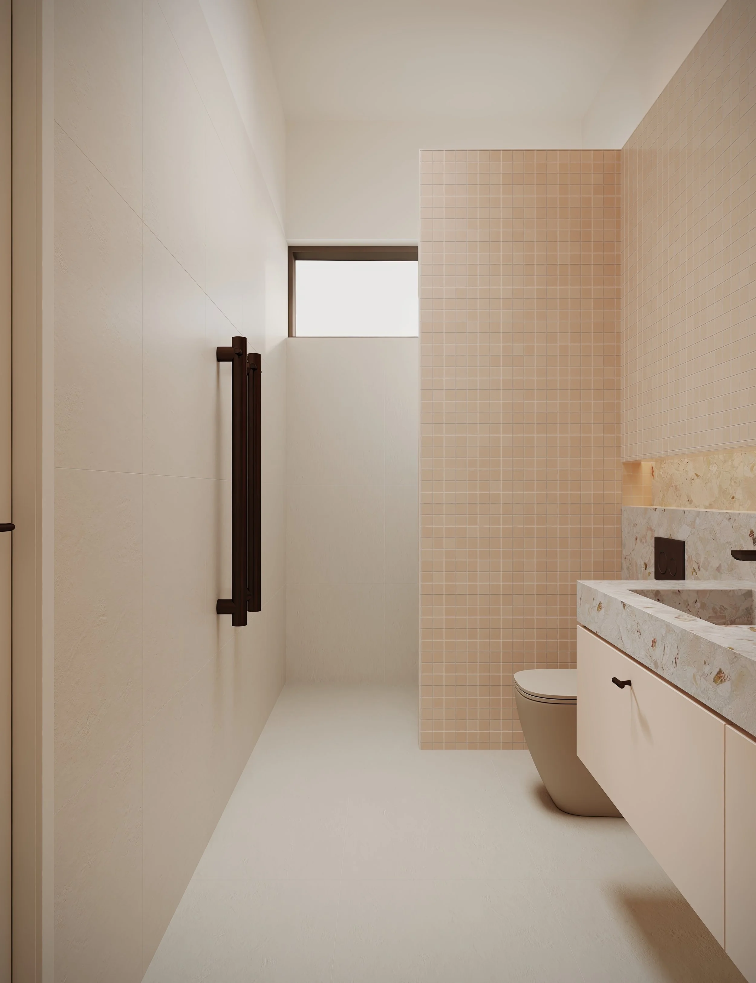 Soft pink bathroom with marble top in soft pink, green, and gold. 
