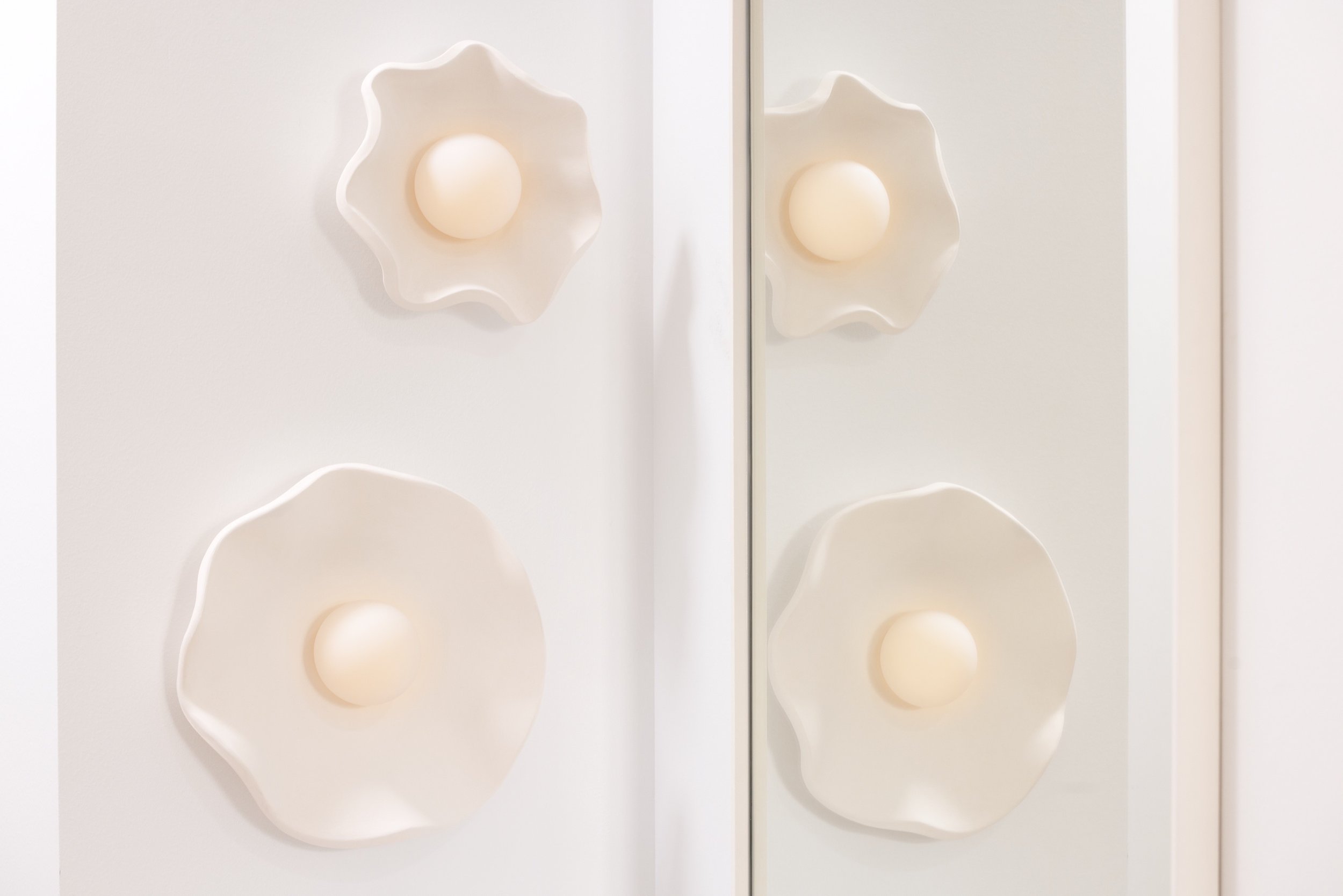 White wall lights in flower design