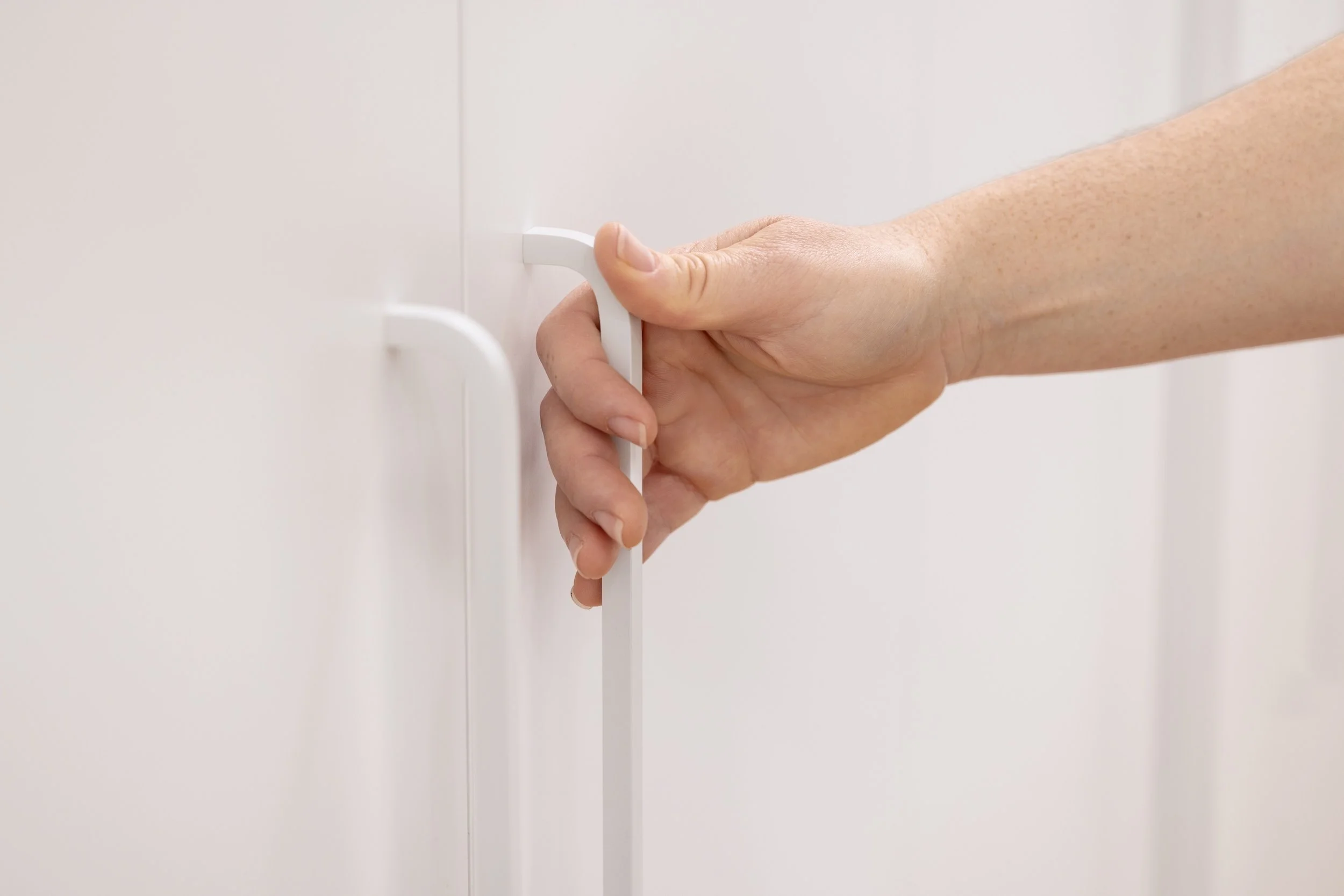Curved white handles