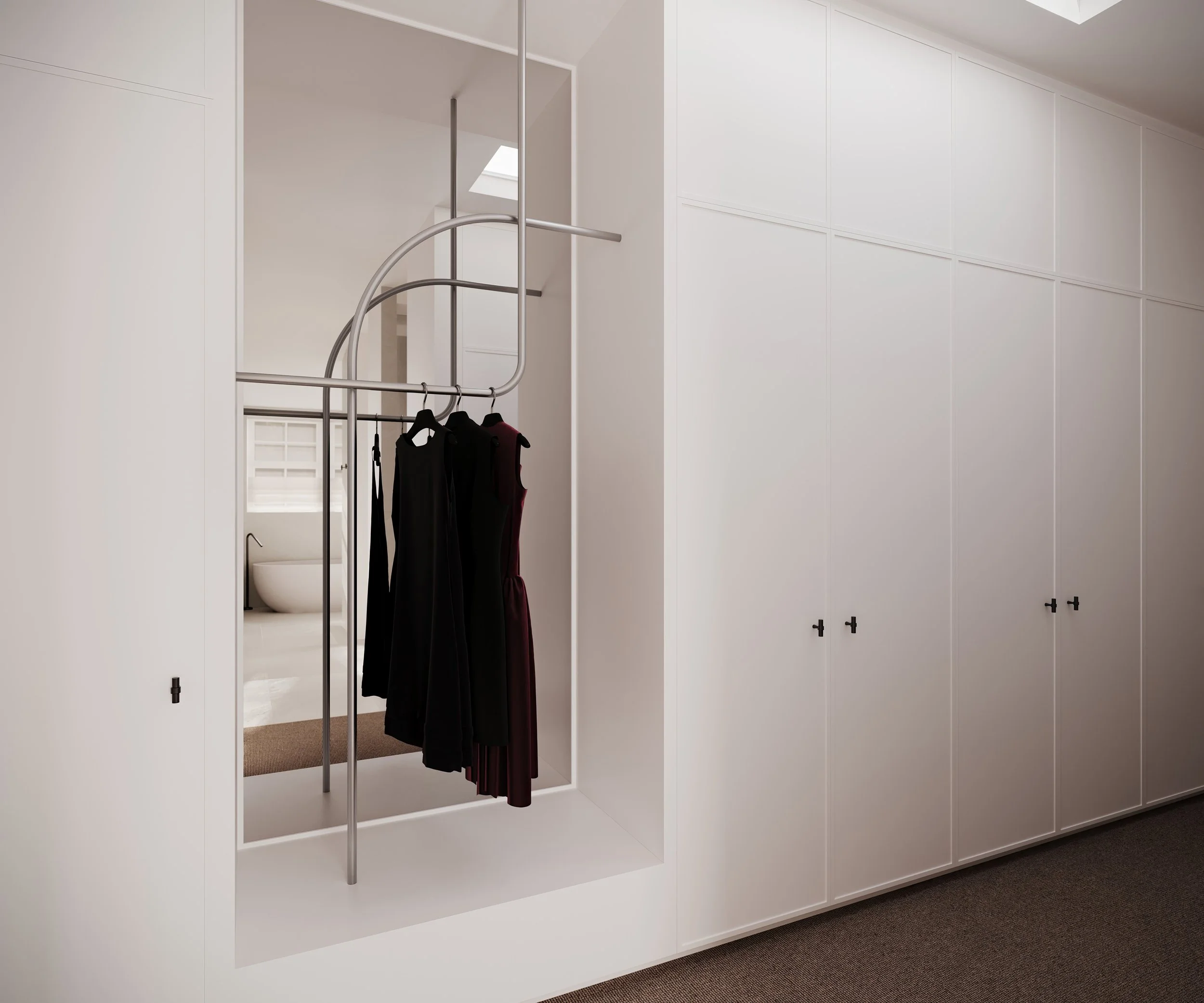 Built in robes in white with feature hanging rail