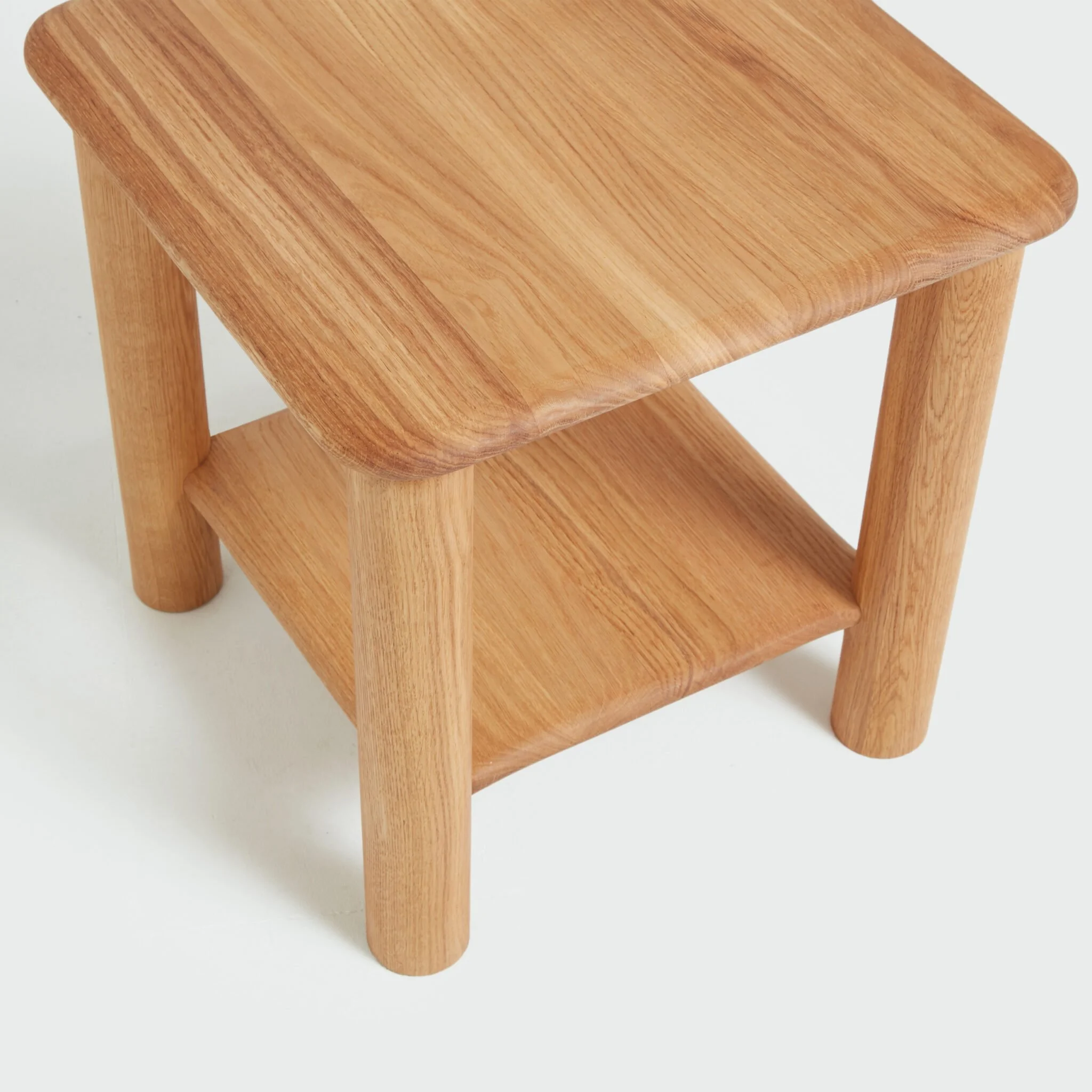 Another Country Feld Side Table showing solid oak grain and rounded detailing