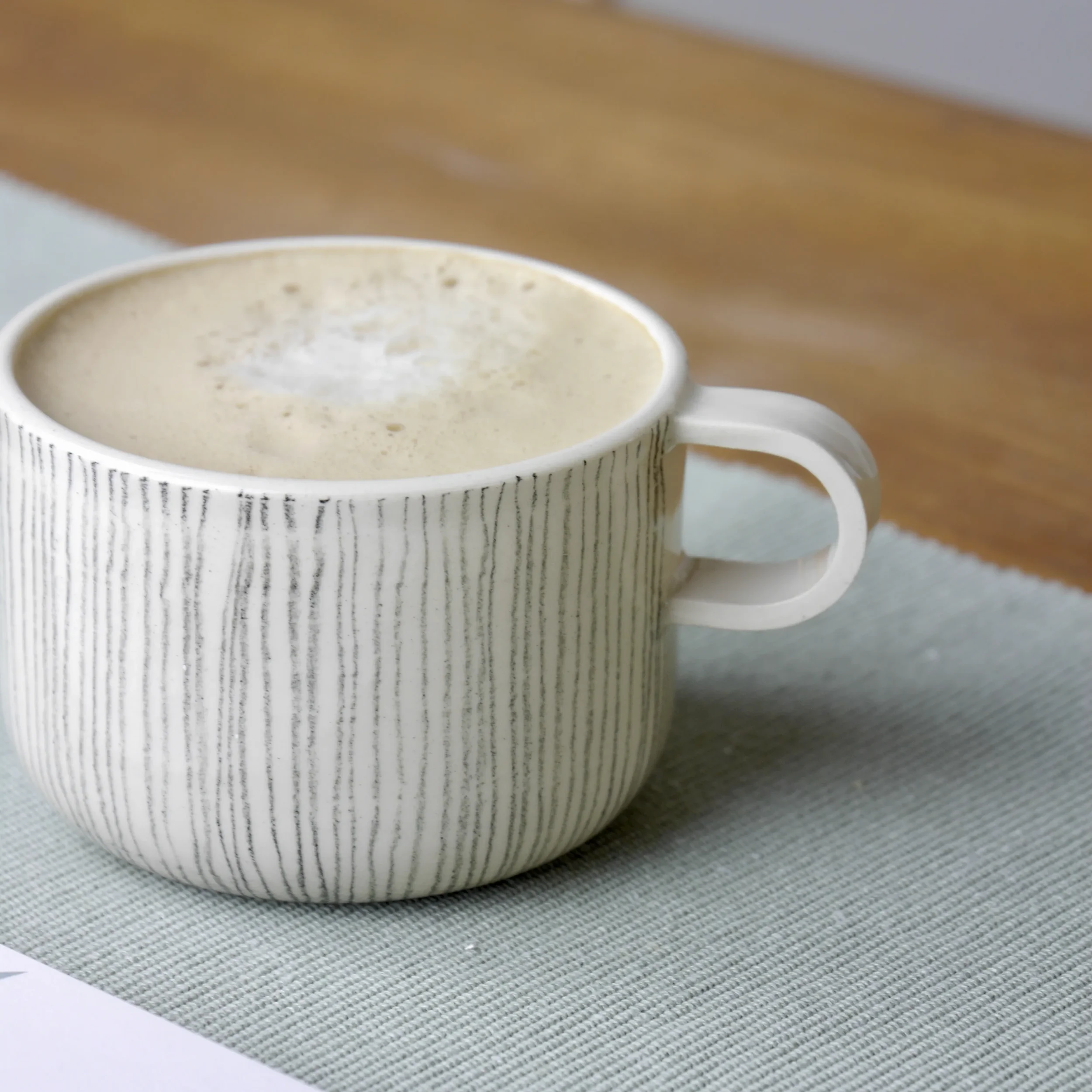 Handmade Throw to Fire Curved Mug with hand-drawn linework