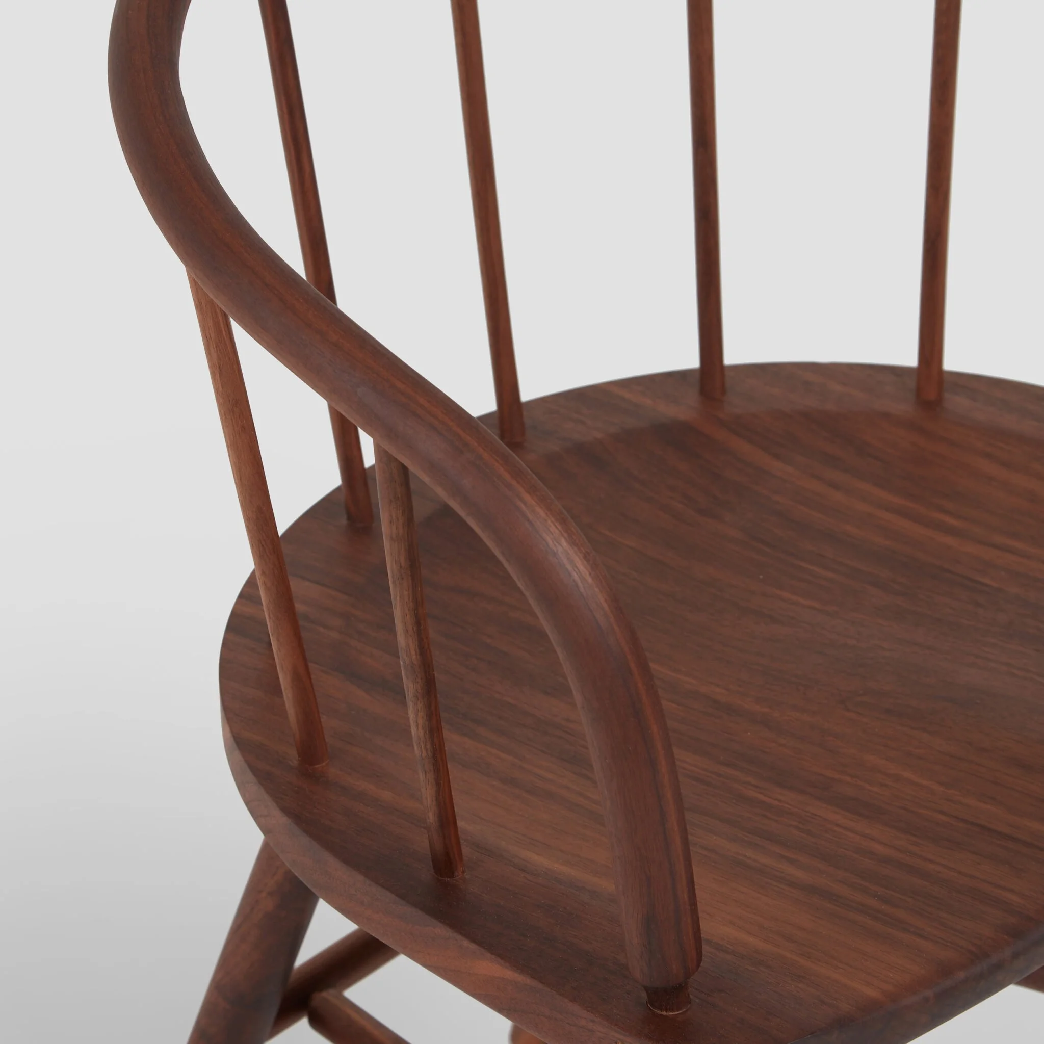 Hardy Chair showing its steam-bent solid timber back and curved arms (Copy)