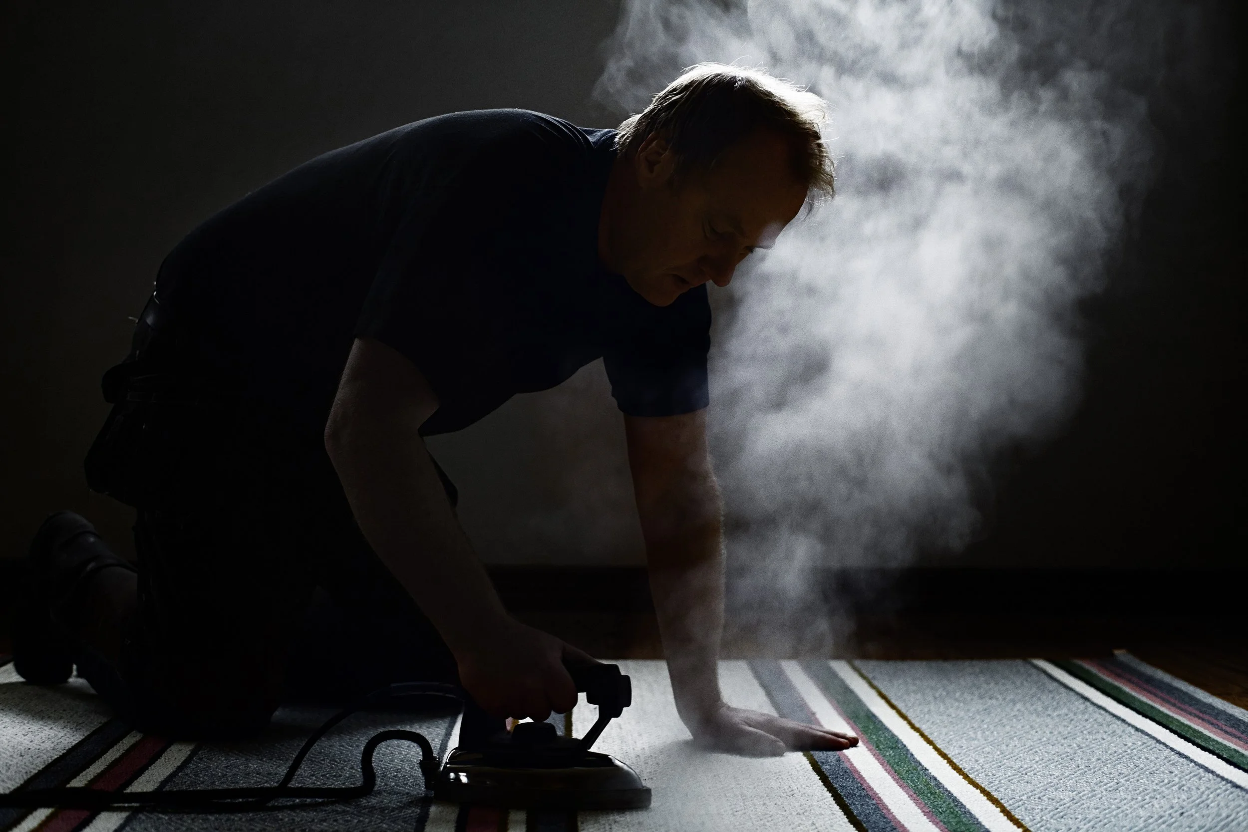 Kasthall_Factory_hands_ironing (1).jpg