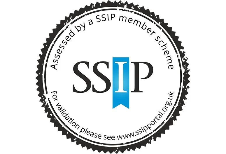 SSIP certification seal with circular black border, black text, and a blue ribbon with 'I' in the center, indicating assessment by a SSIP member scheme.