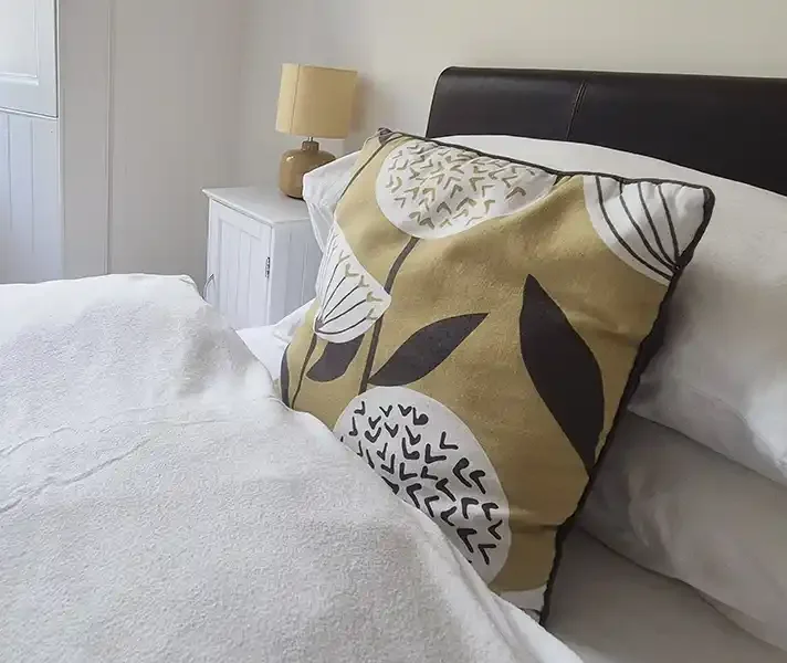 woll-estate-retreats-garden-flat-bed-cushions.webp