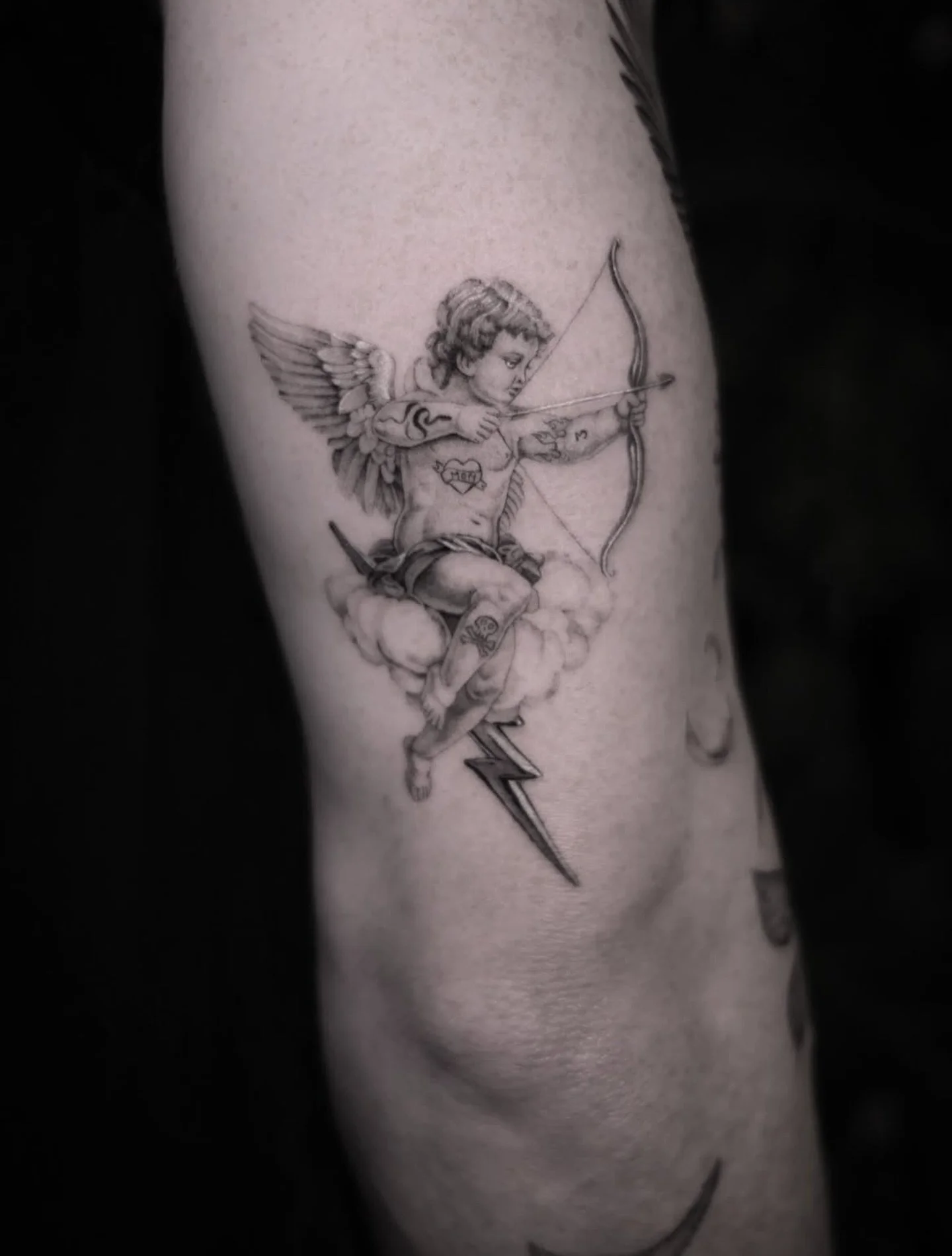 The cutest tattooed Cupid by @victoriado hit her up for bookings!