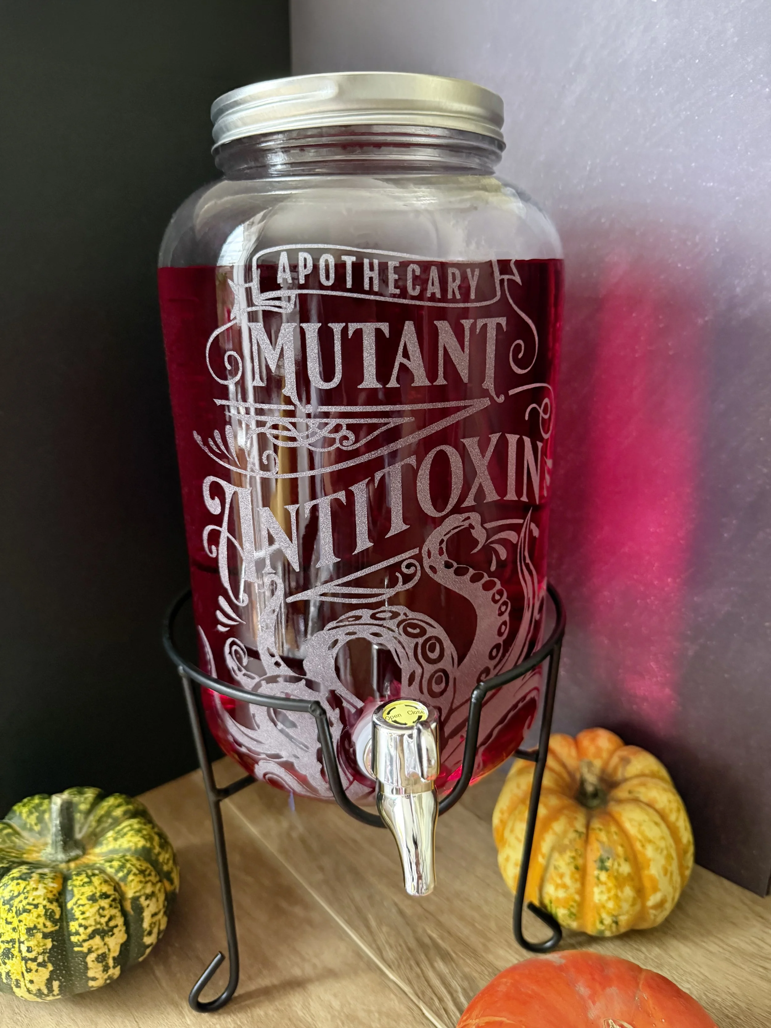 Filled dispenser and stand.jpg