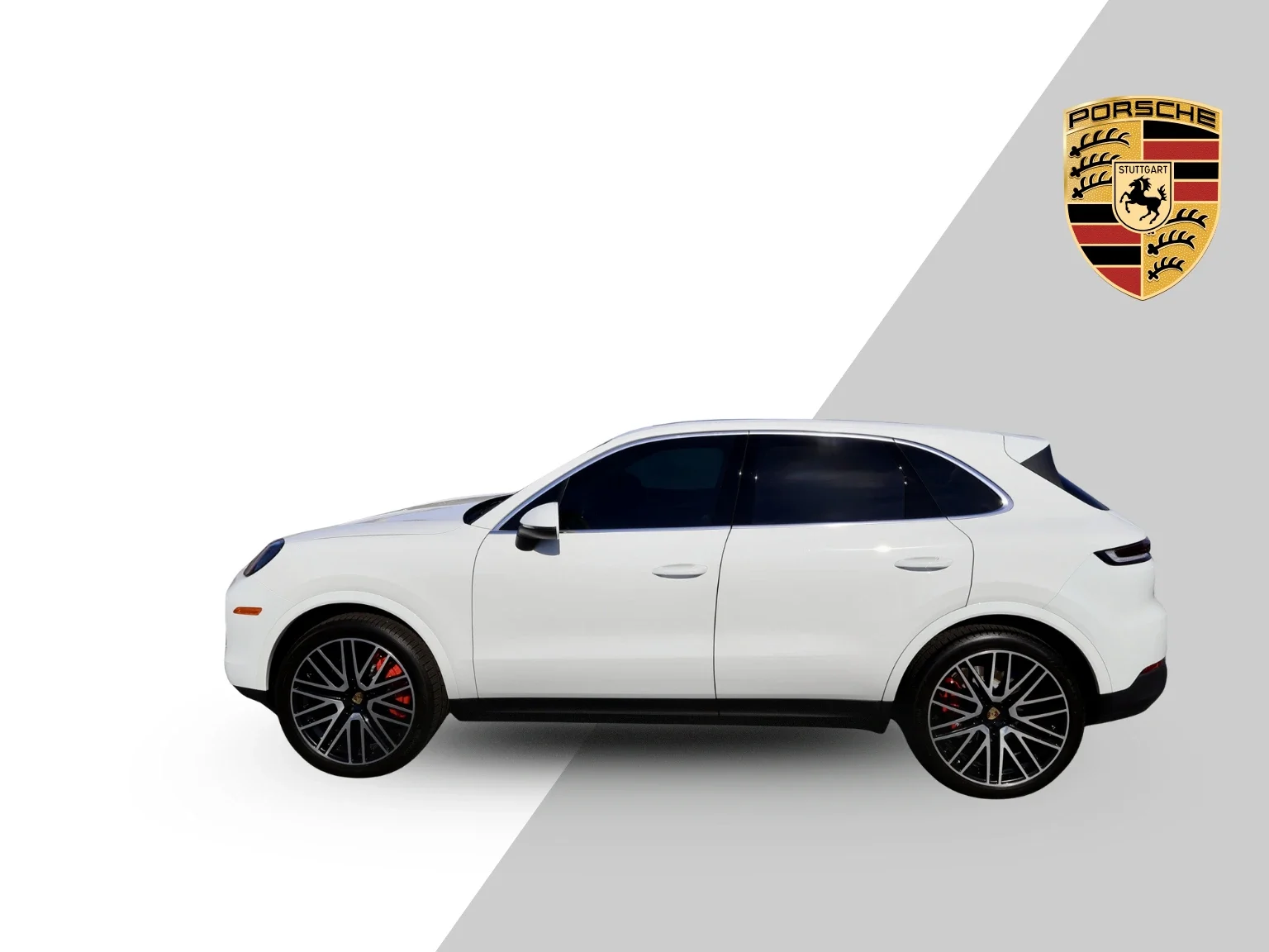 A white luxury SUV with black wheels parked on a background split diagonally, white on the left and gray on the right, with Porsche and Stuttgart badges on the top right corner.